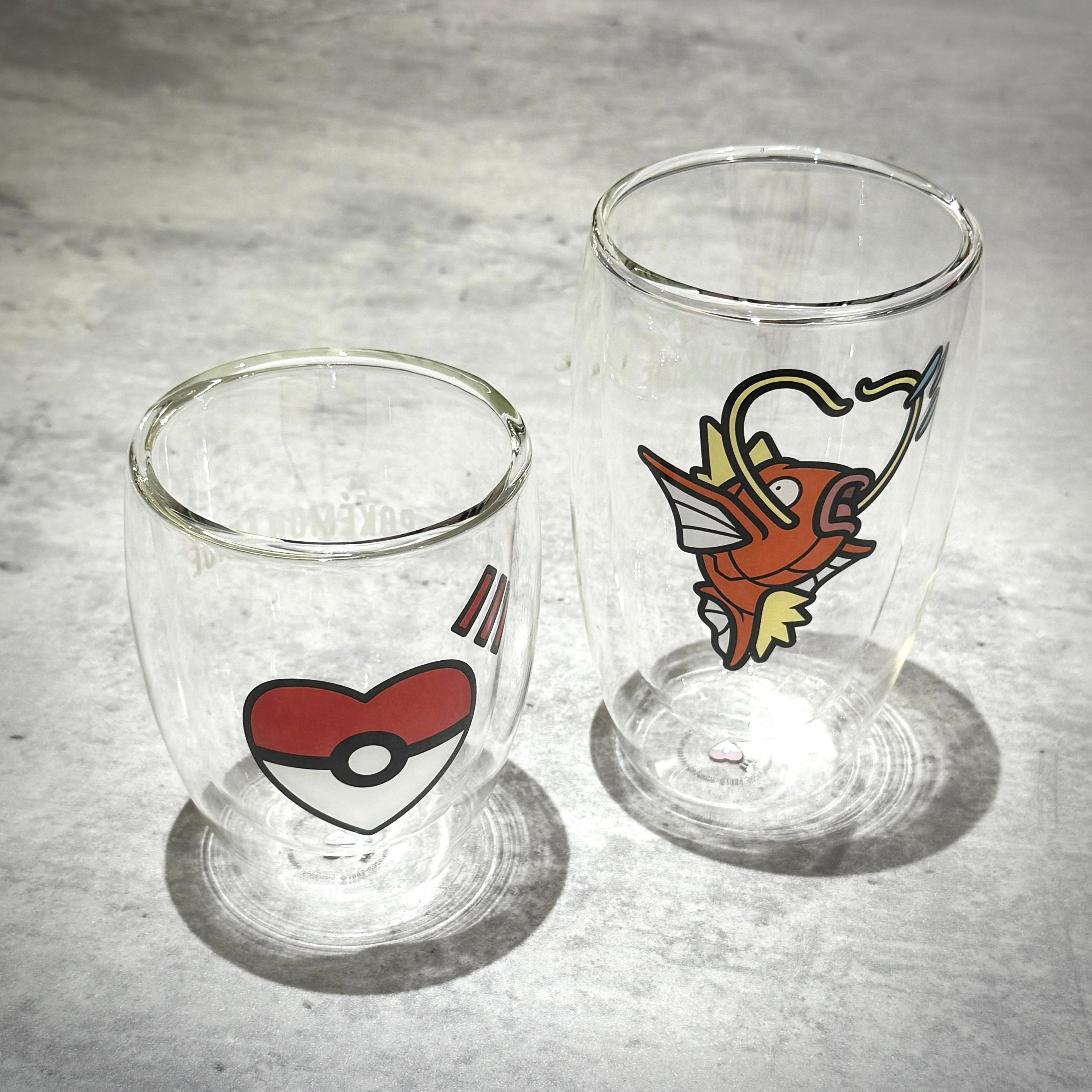 Human Made x Pokemon Double Wall Glass featuring Pokeball and Magikarp designs.