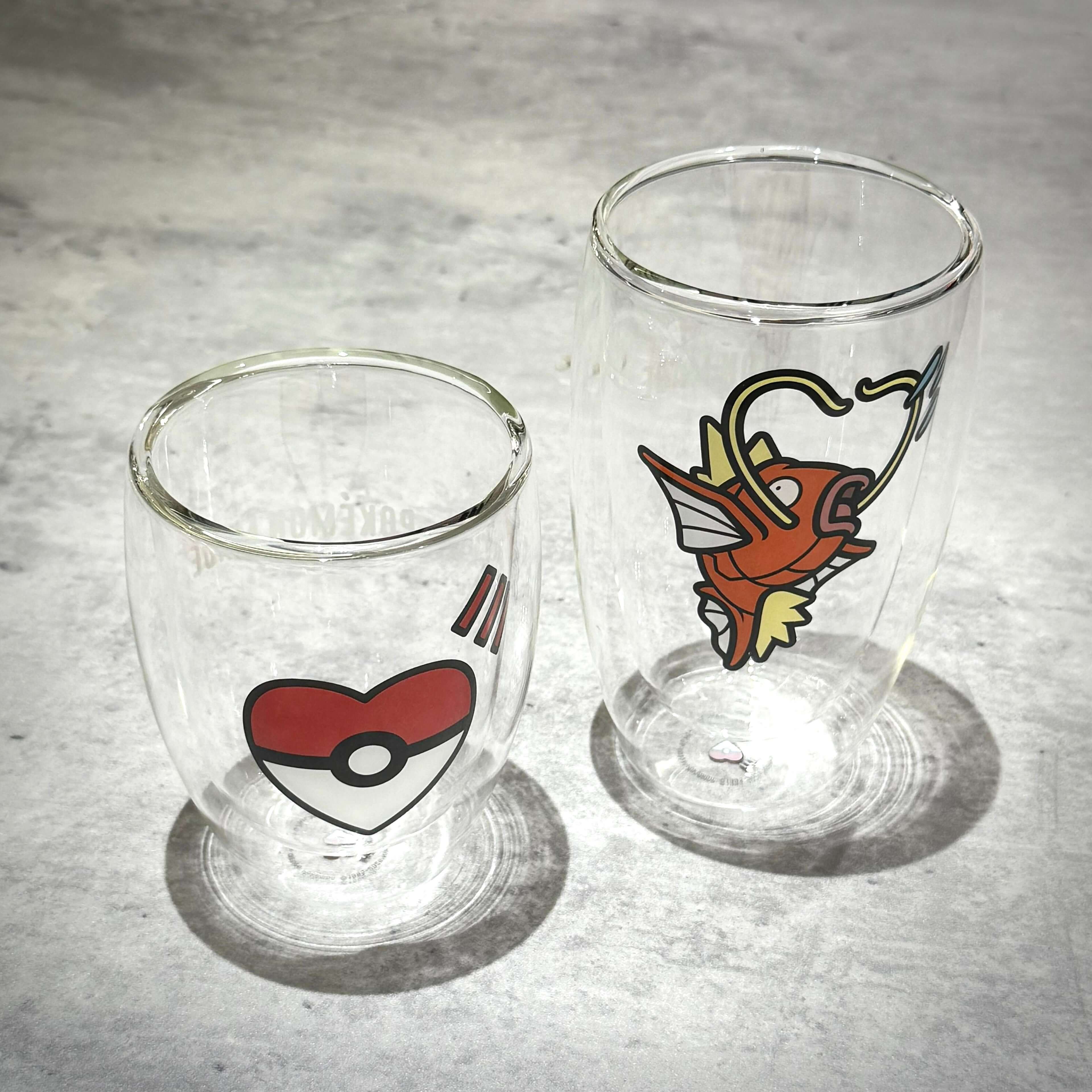 Human Made x Pokemon Double Wall Glass featuring Pokeball and Magikarp designs.