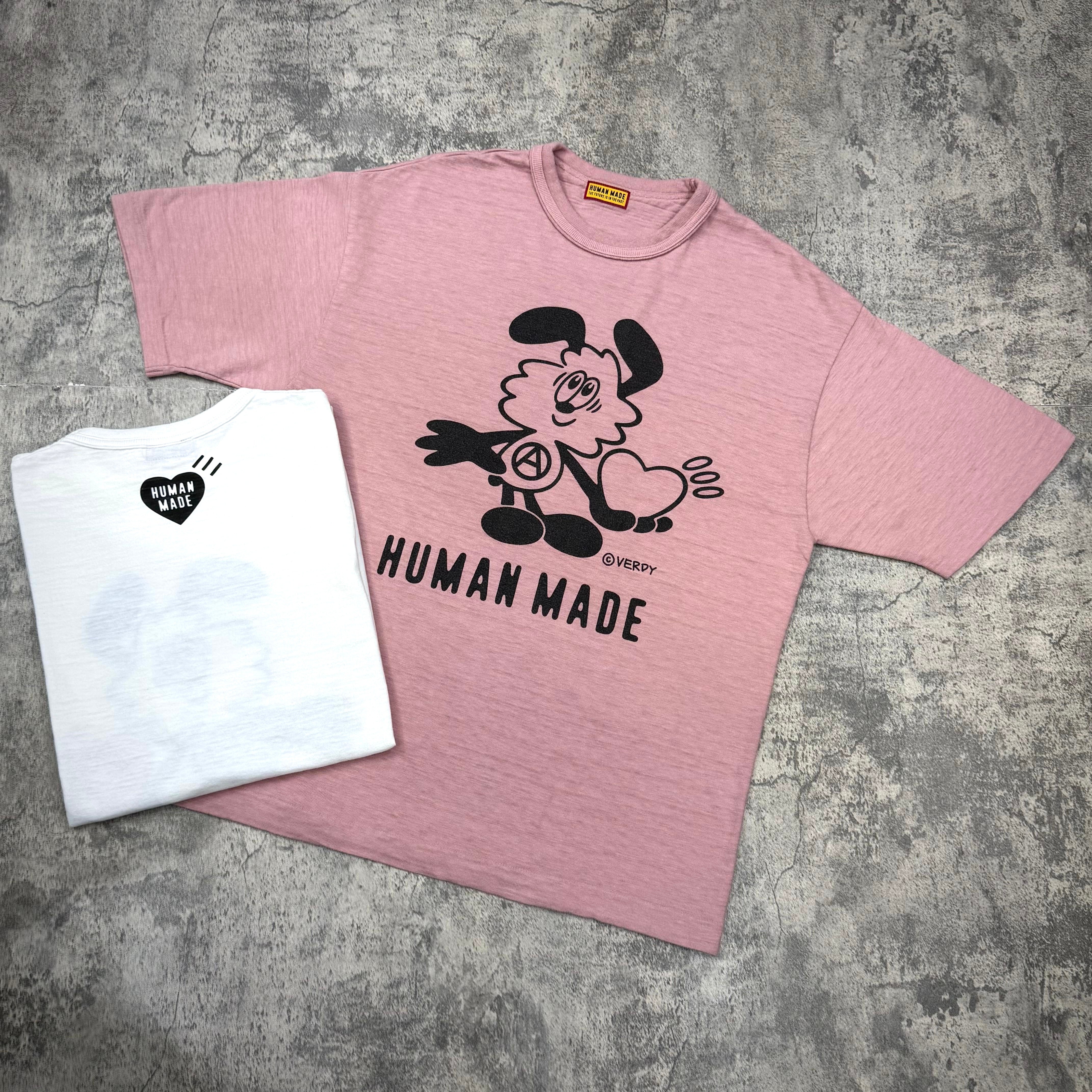 Human Made x VERDY Jamsil Exclusive Vick Tee in pink color with cartoon graphic and white tee in background.