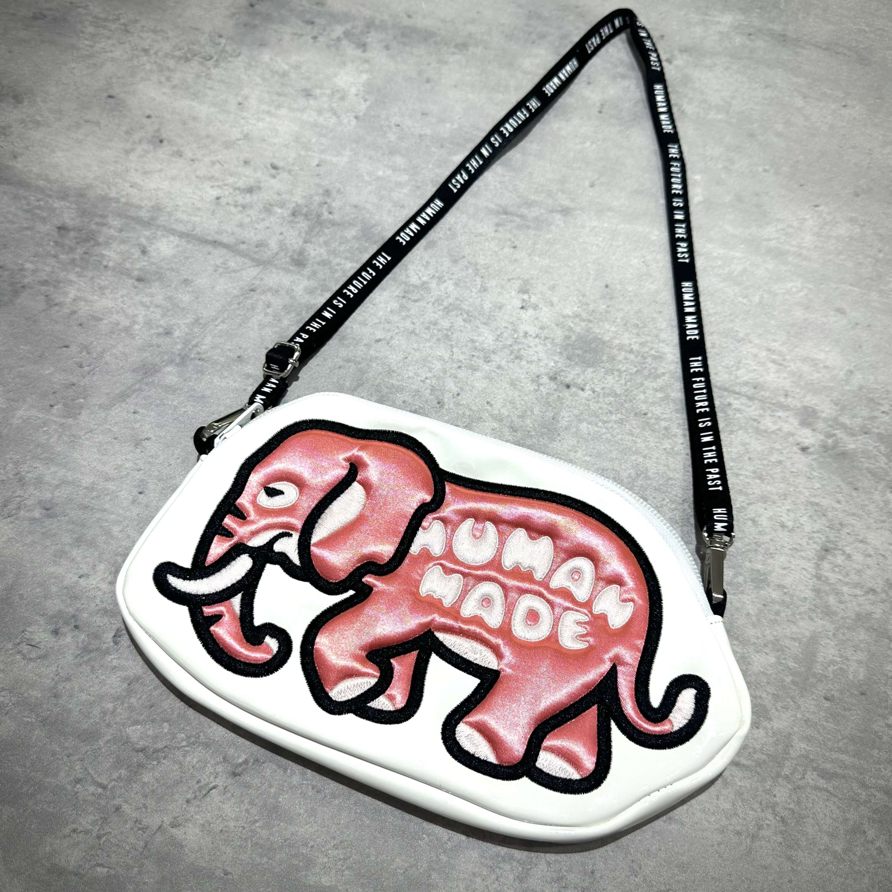 Human Made Bangkok Exclusive Elephant Pouch featuring a colorful elephant design on a white background.