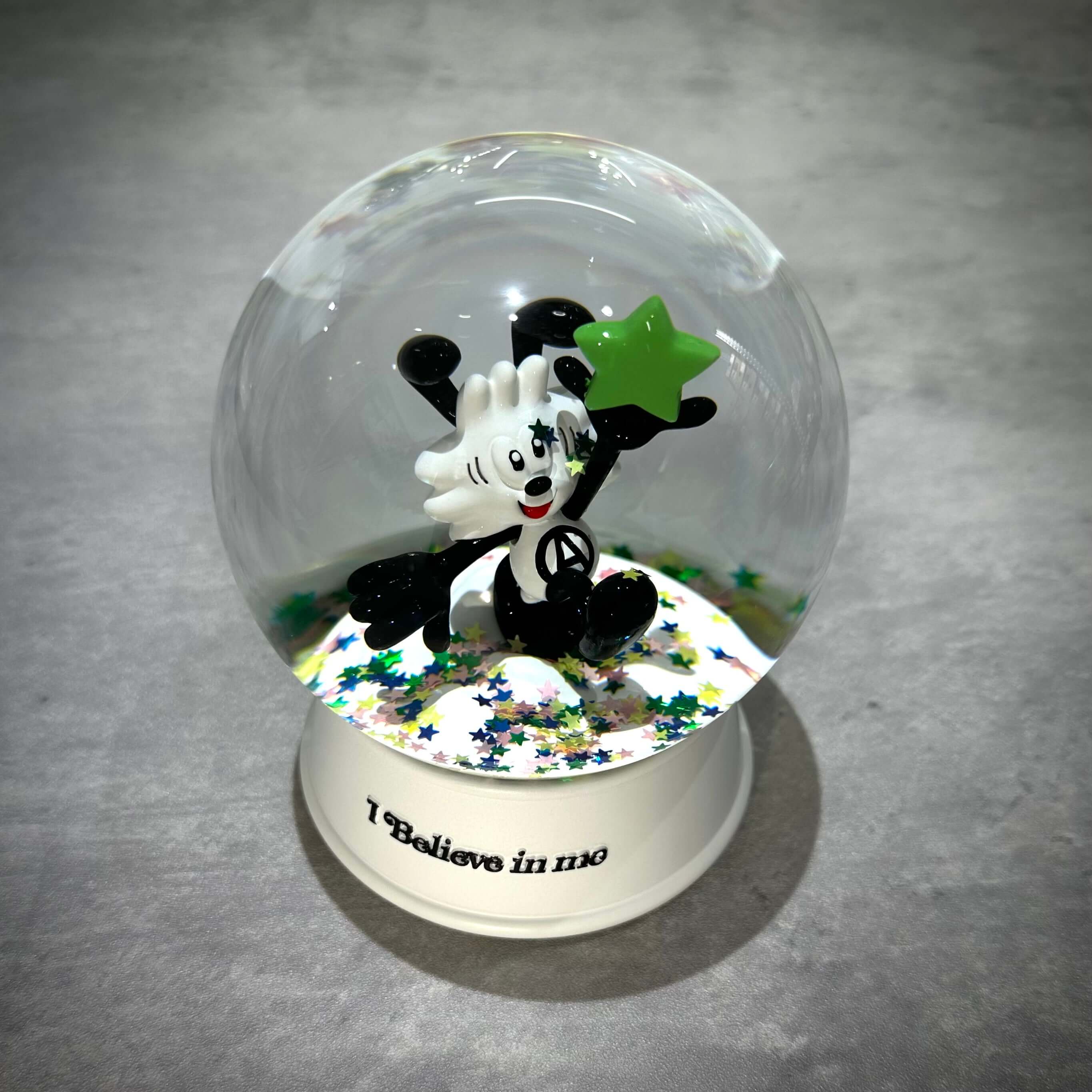 Verdy x Lottemuseum snow globe featuring a character with a green star and the phrase 'I Believe in me'