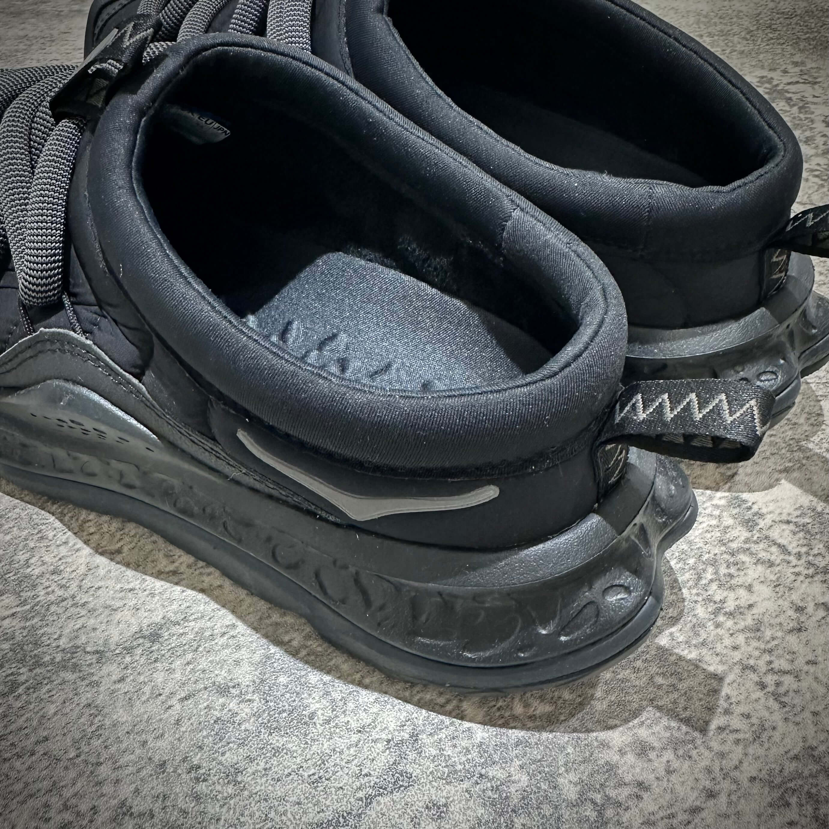 Hoka Ora Primo - Black close-up of the shoe's interior and sole design showcasing premium materials.