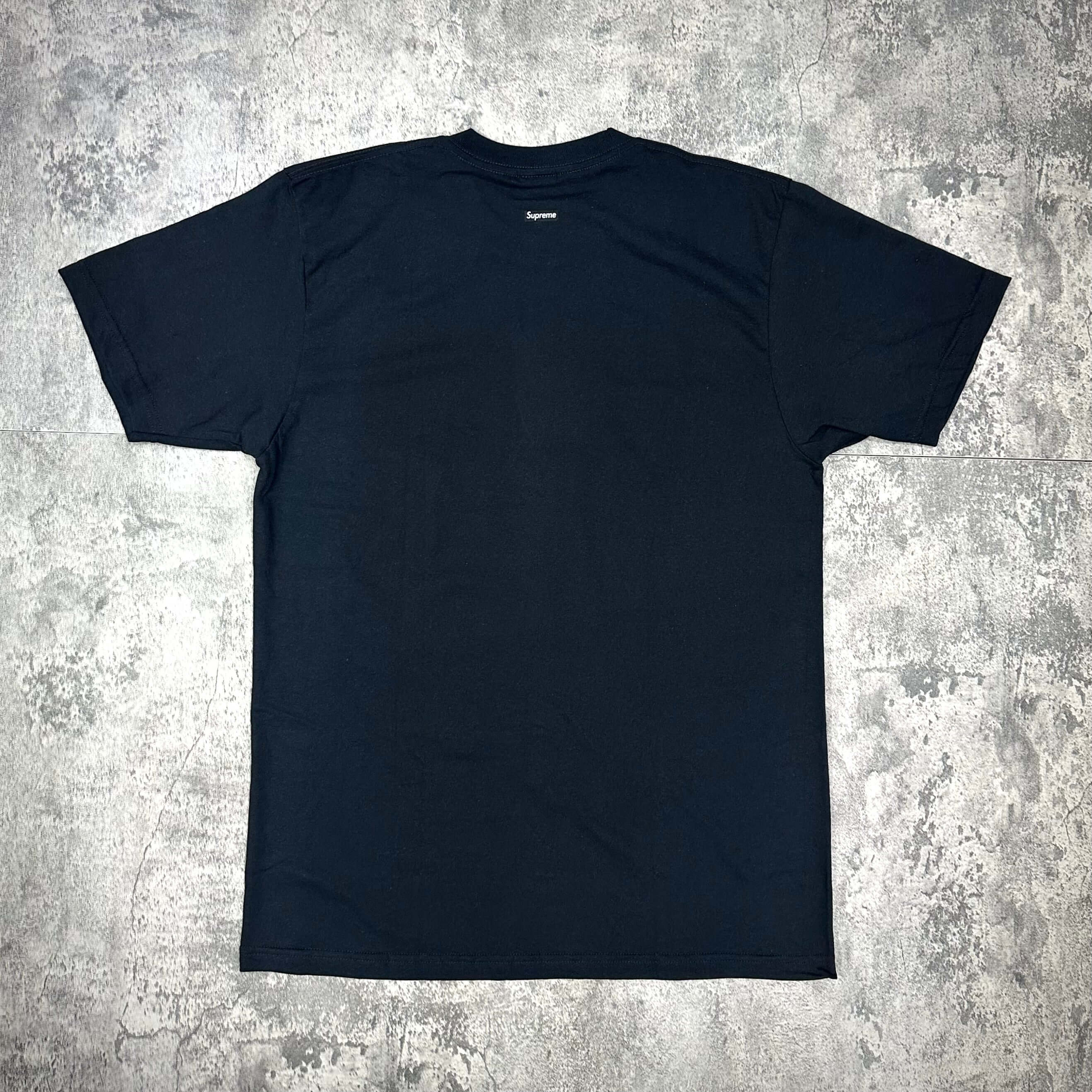 Back view of Supreme AliWarhol Tee - Black, featuring the Supreme logo on the upper back.