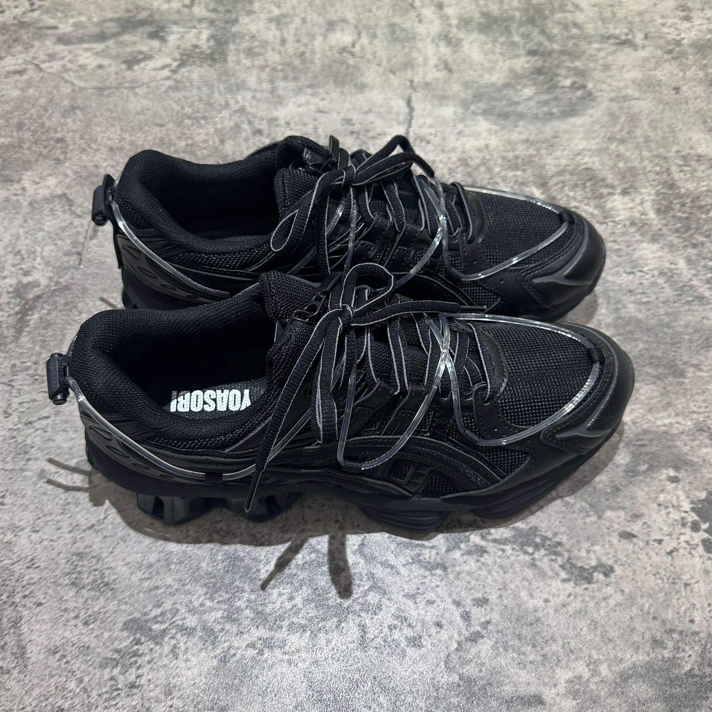 Yoasobi x Asics Gel Kinetic Fluent Y - Black sneakers from the top view, showcasing sleek black design and modern style.