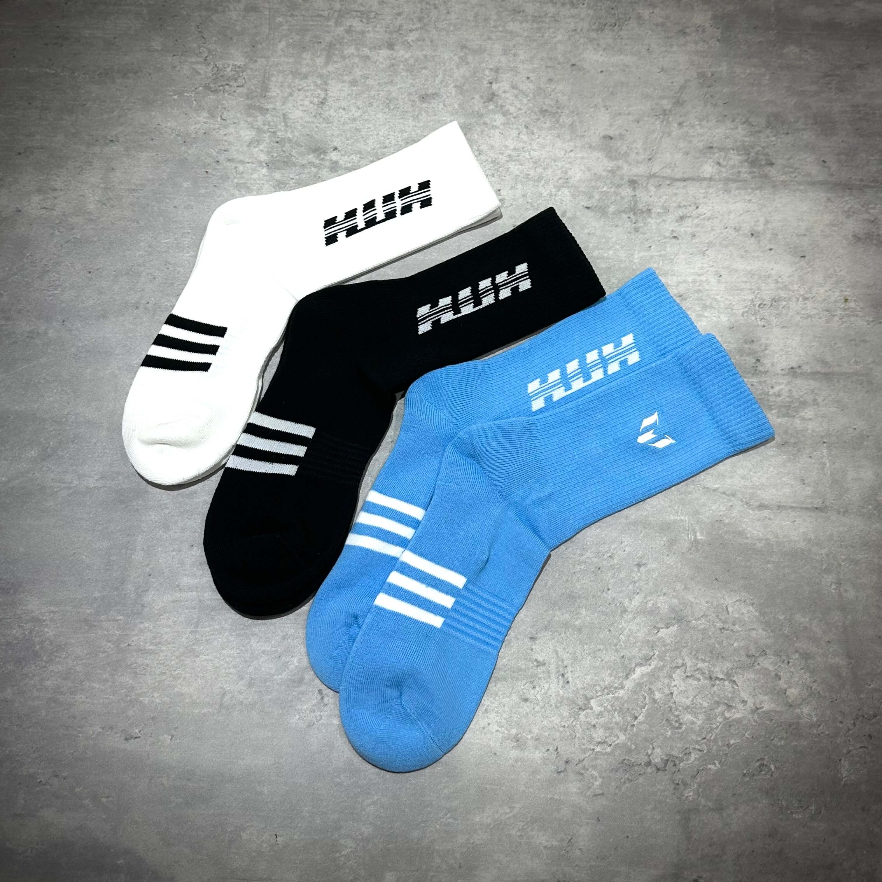 KITH x MESSI for adidas Football 3-Pair Crew Socks displayed in white, black, and blue colors.