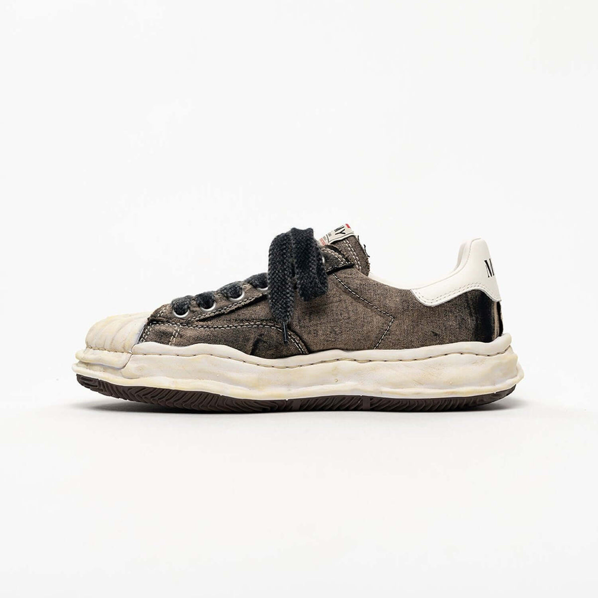 MMY Blakey Bleached Canvas Low - Black A17FW731 side view of stylish bleached canvas sneakers with unique details.