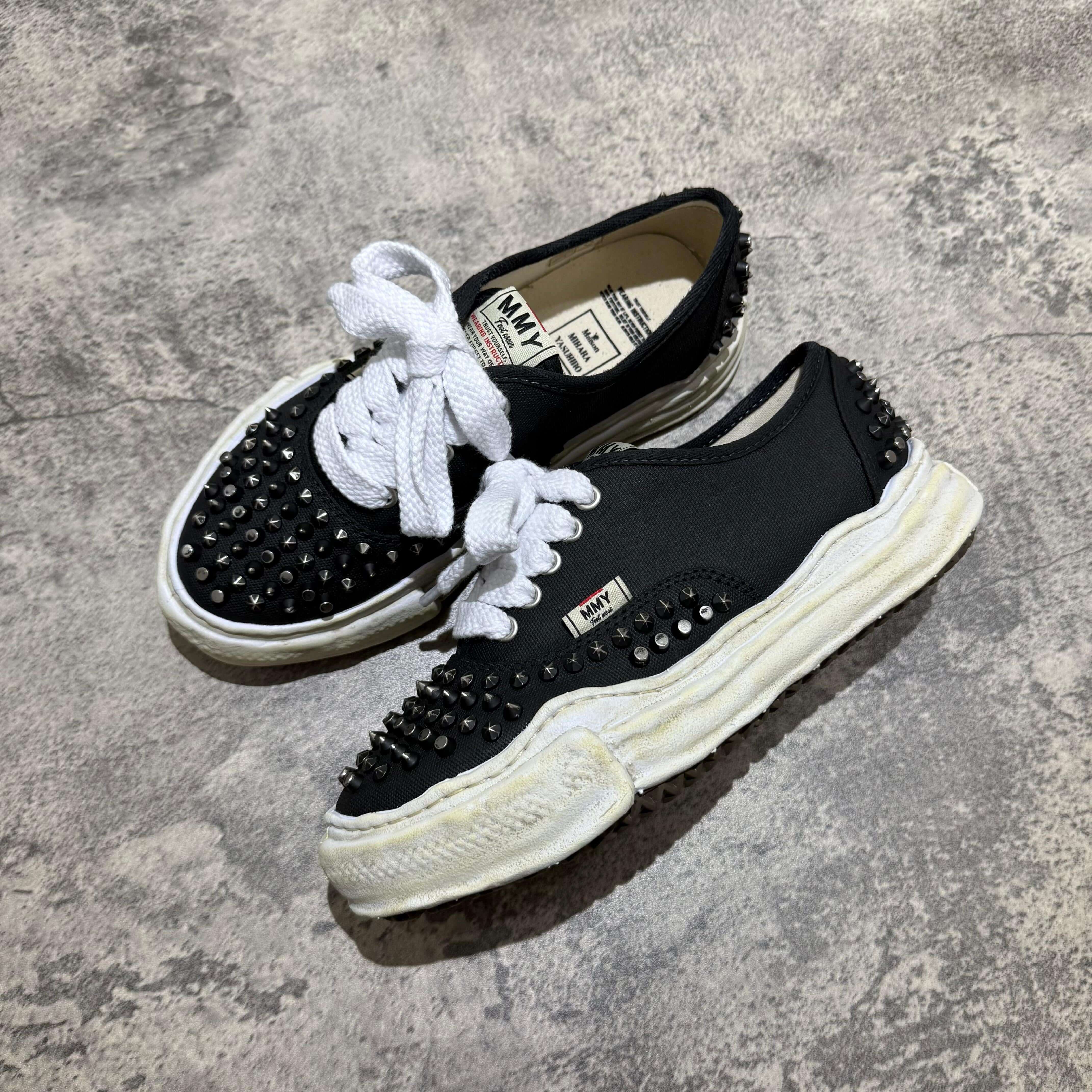 MMY Baker Studded Canvas Low - Black/White shoes with oversized studded design and white laces, featuring MMY PETERSON OG Canvas - Natural