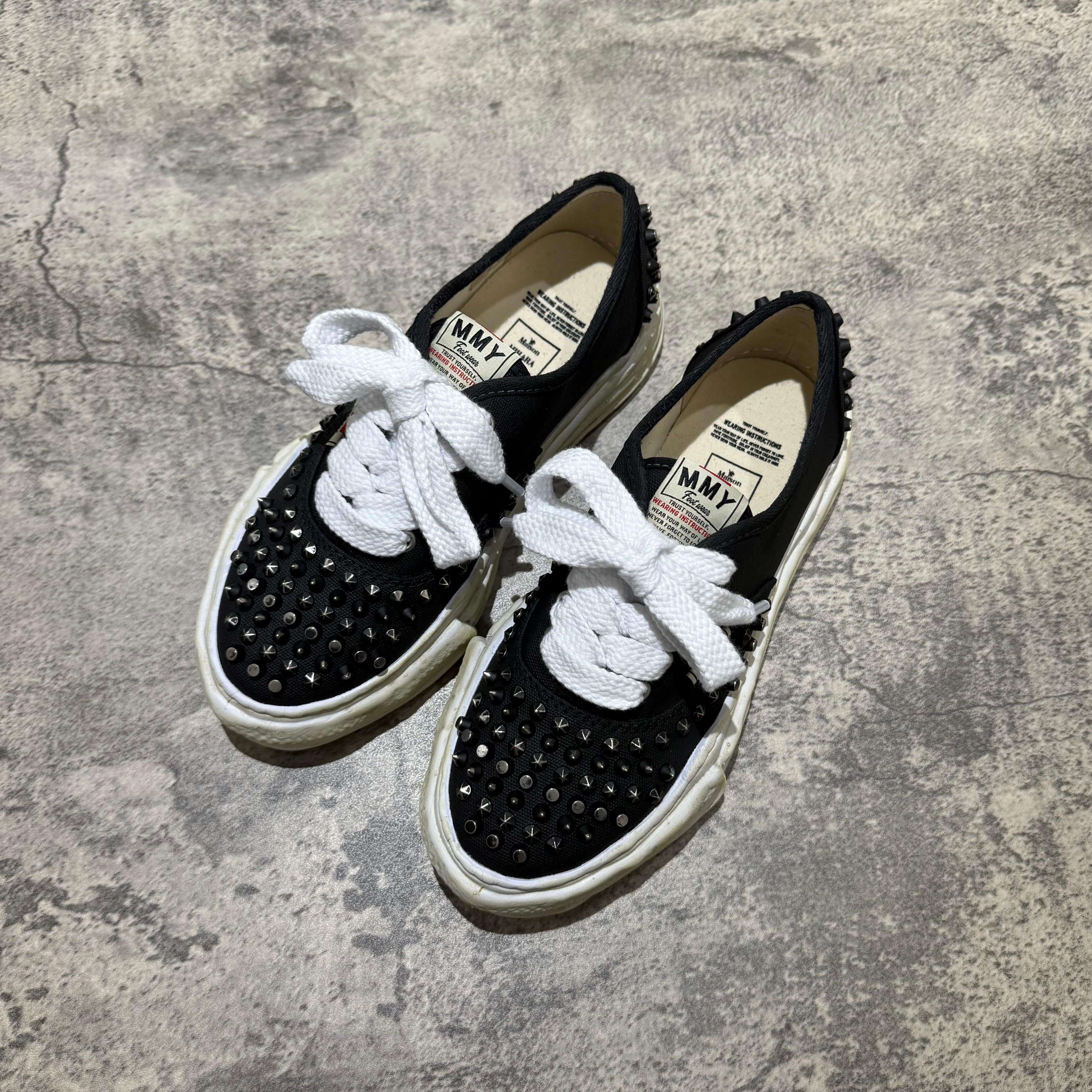 MMY Baker Studded Canvas Low in Black/White featuring oversized design and iconic spikes, part of MMY PETERSON OG Canvas - Natural collection.