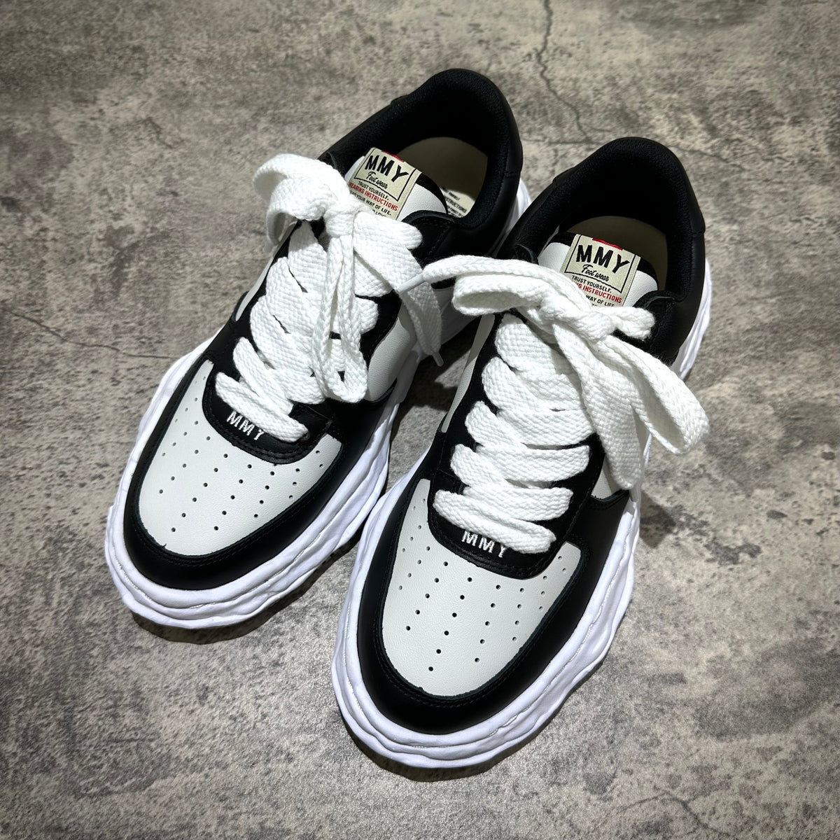 MMY WAYNE OG Leather sneakers in black and white with thick white laces and classic design.