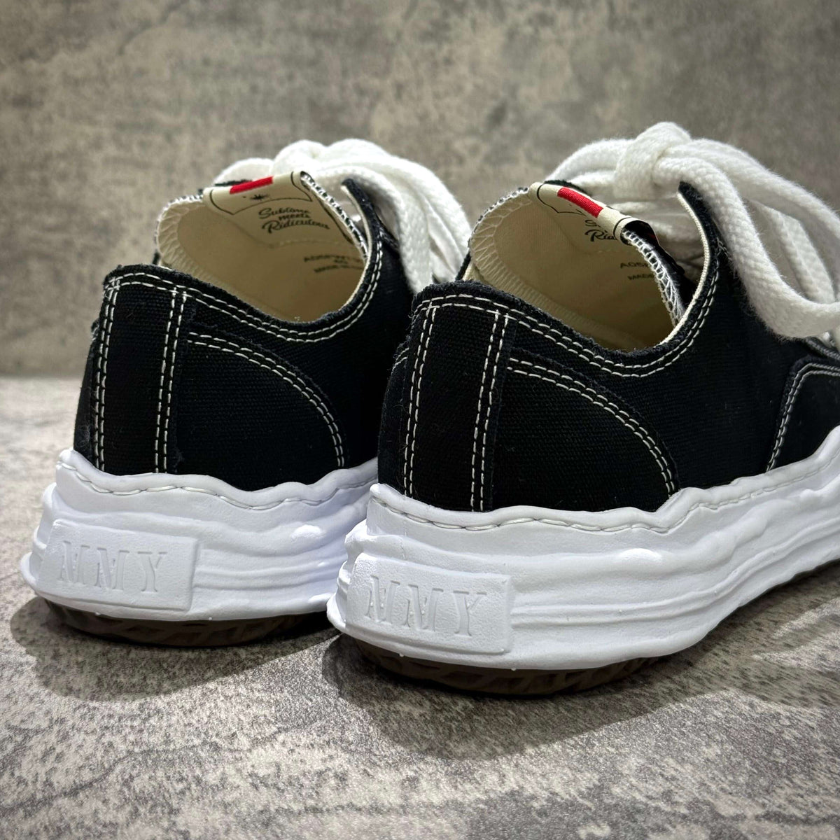 MMY HANK OG Canvas - Black back view with white laces and black canvas upper, showcasing the sole details.