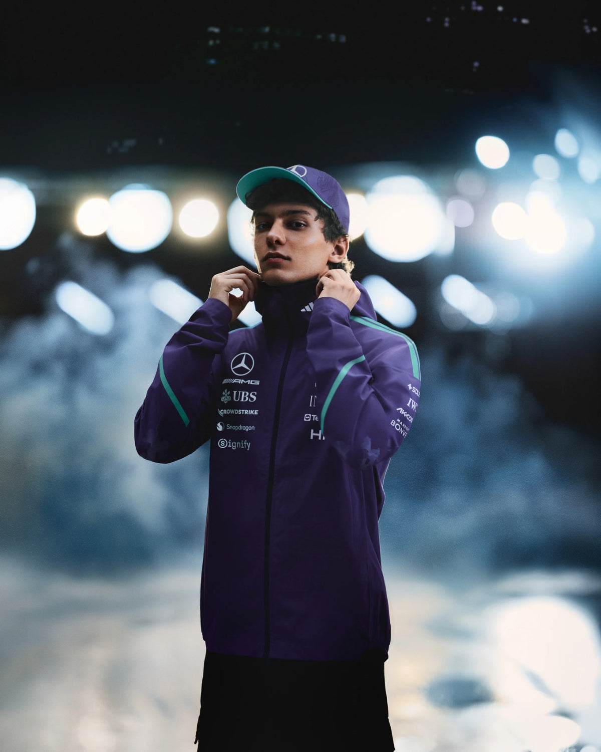 Mercedes-AMG Petronas Formula 1 Team Vanda Bloom Rain Jacket HZ9485 worn by a model, showcasing stylish outerwear.