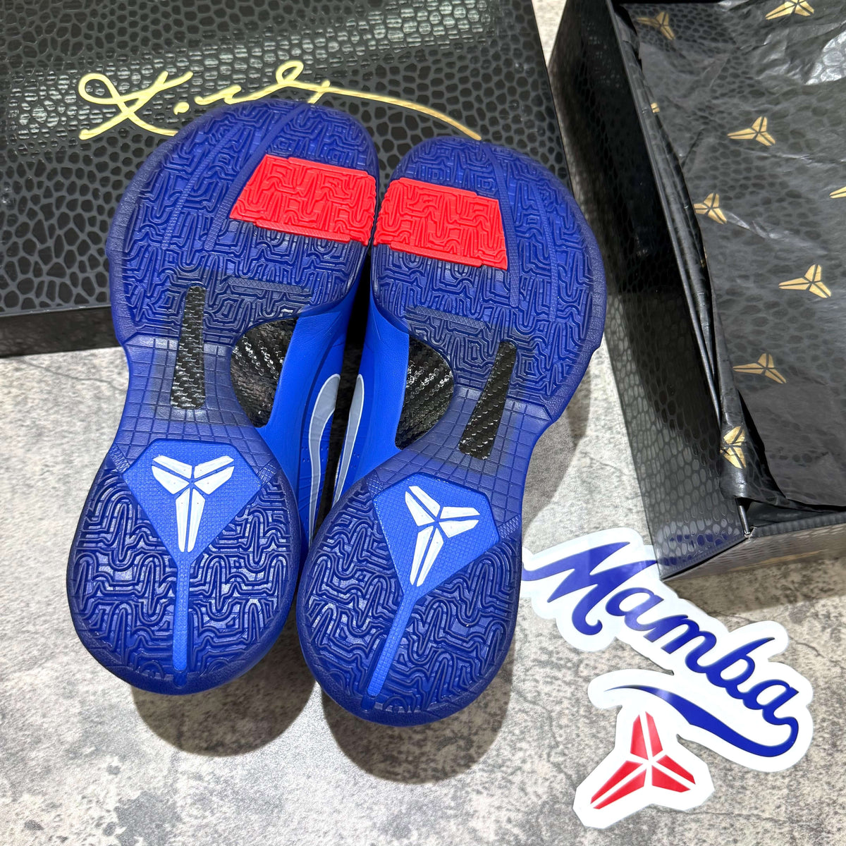 Nike Zoom Kobe 5 Protro Dodgers IO6256-400 outsole view with Mamba logo and signature details.
