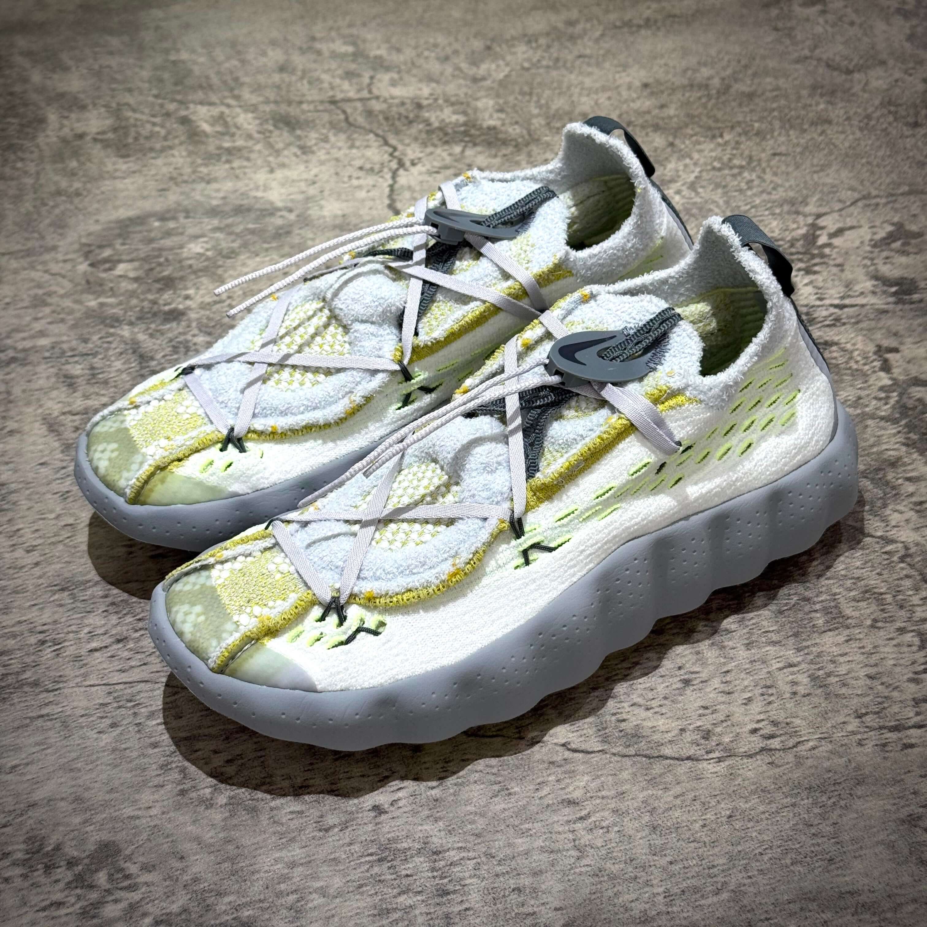 Nike Mind 002 Flyknit - Wolf Grey, stylish sneakers featuring Flyknit design and unique colorway.