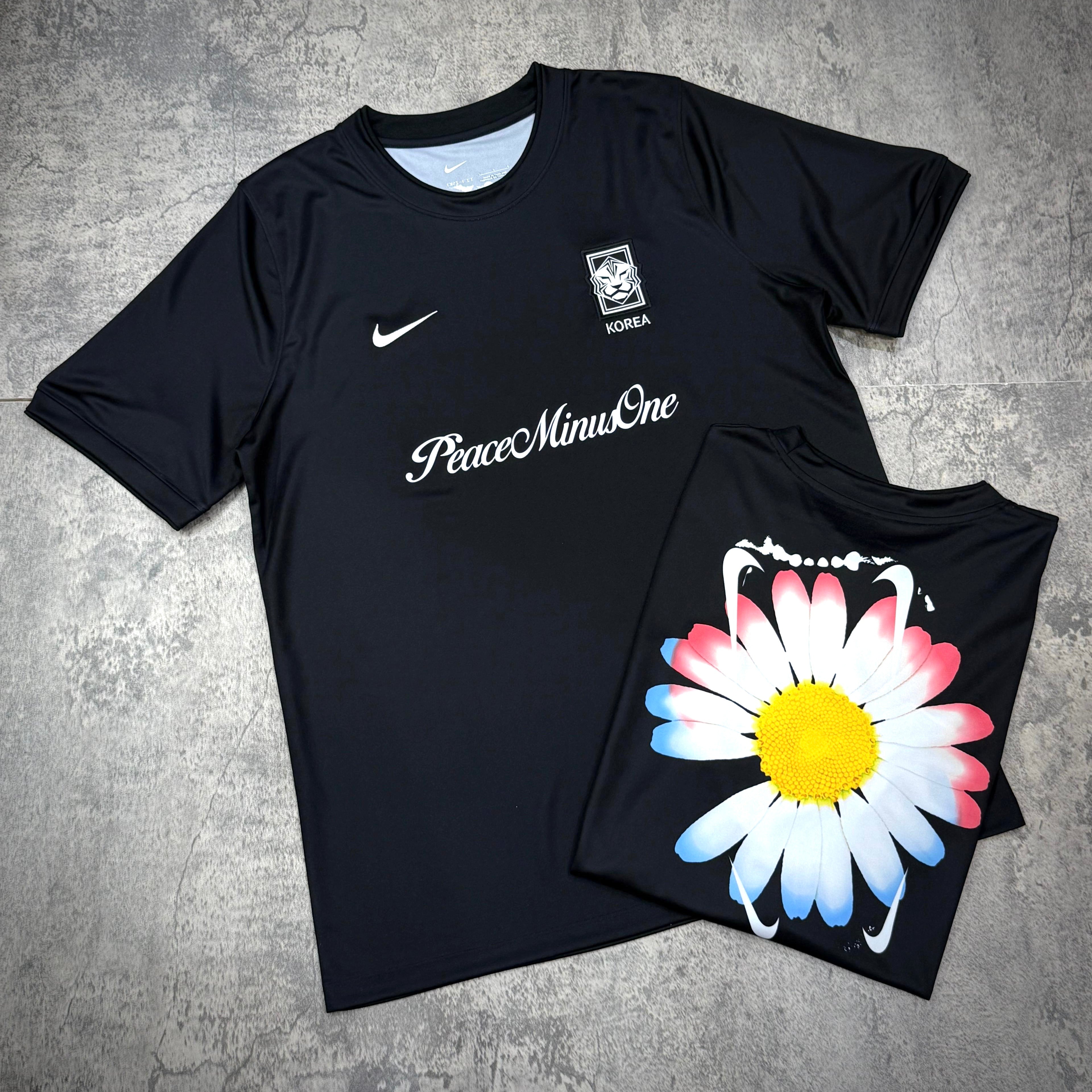 Nike x Peaceminusone x Korea KFA Academy Pro Football Top featuring bold flower graphic, stylish design and authentic branding.