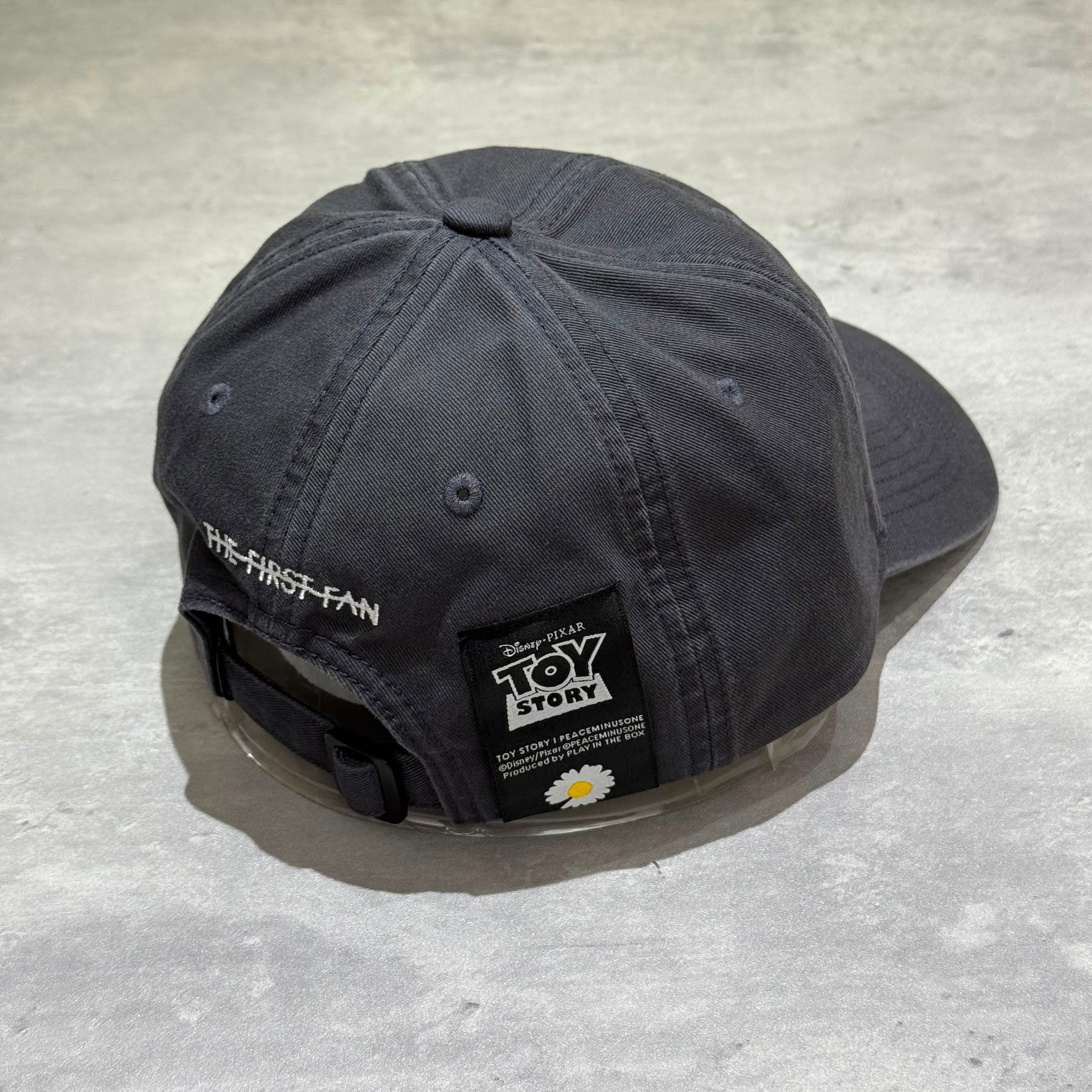 PEACEMINUSONE x Toy Story The First Fan - Cap 01 back view showing the design and logo tag.