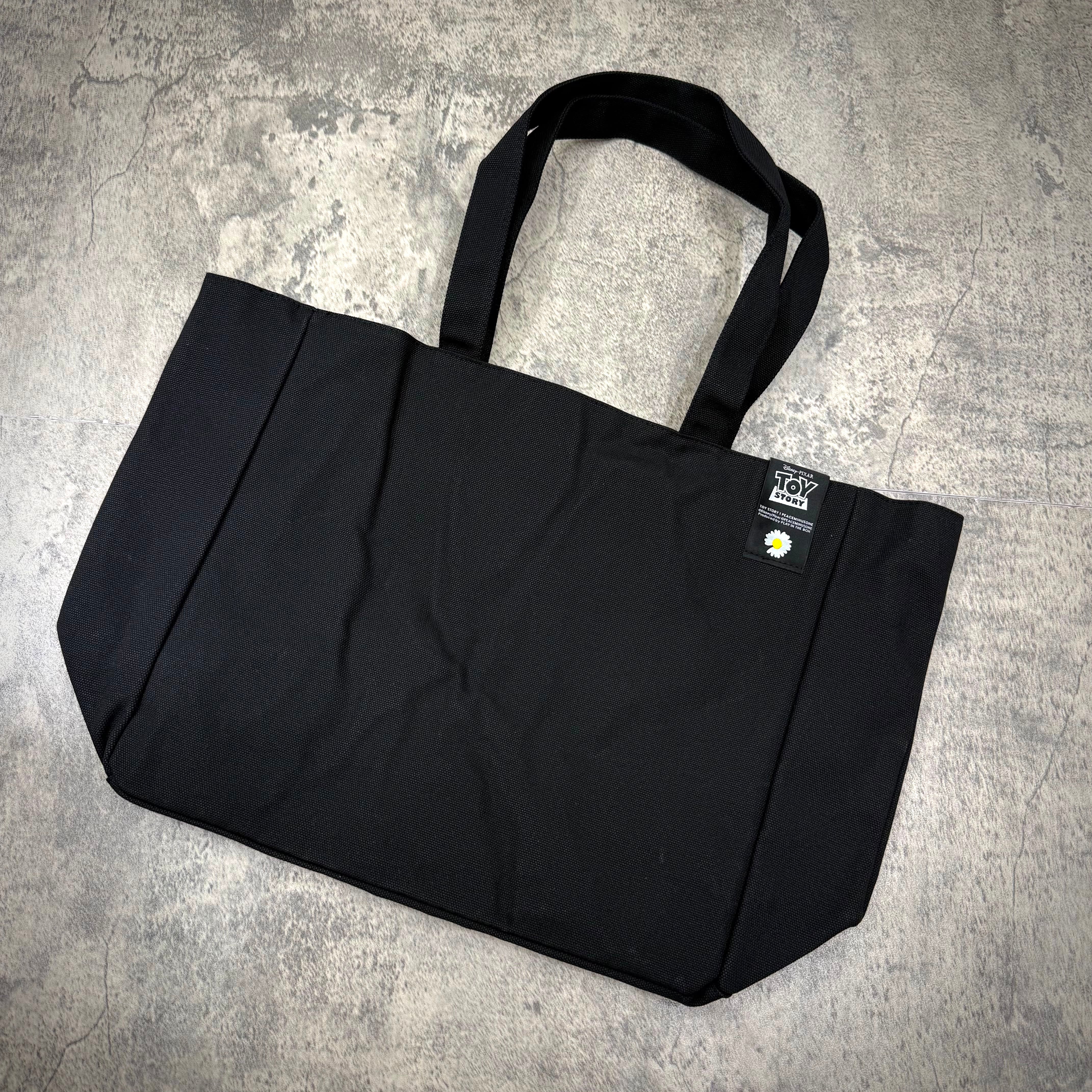 PEACEMINUSONE x Toy Story The First Fan - Tote Bag 02 Seoul, black tote with Toy Story logo, stylish and functional design.