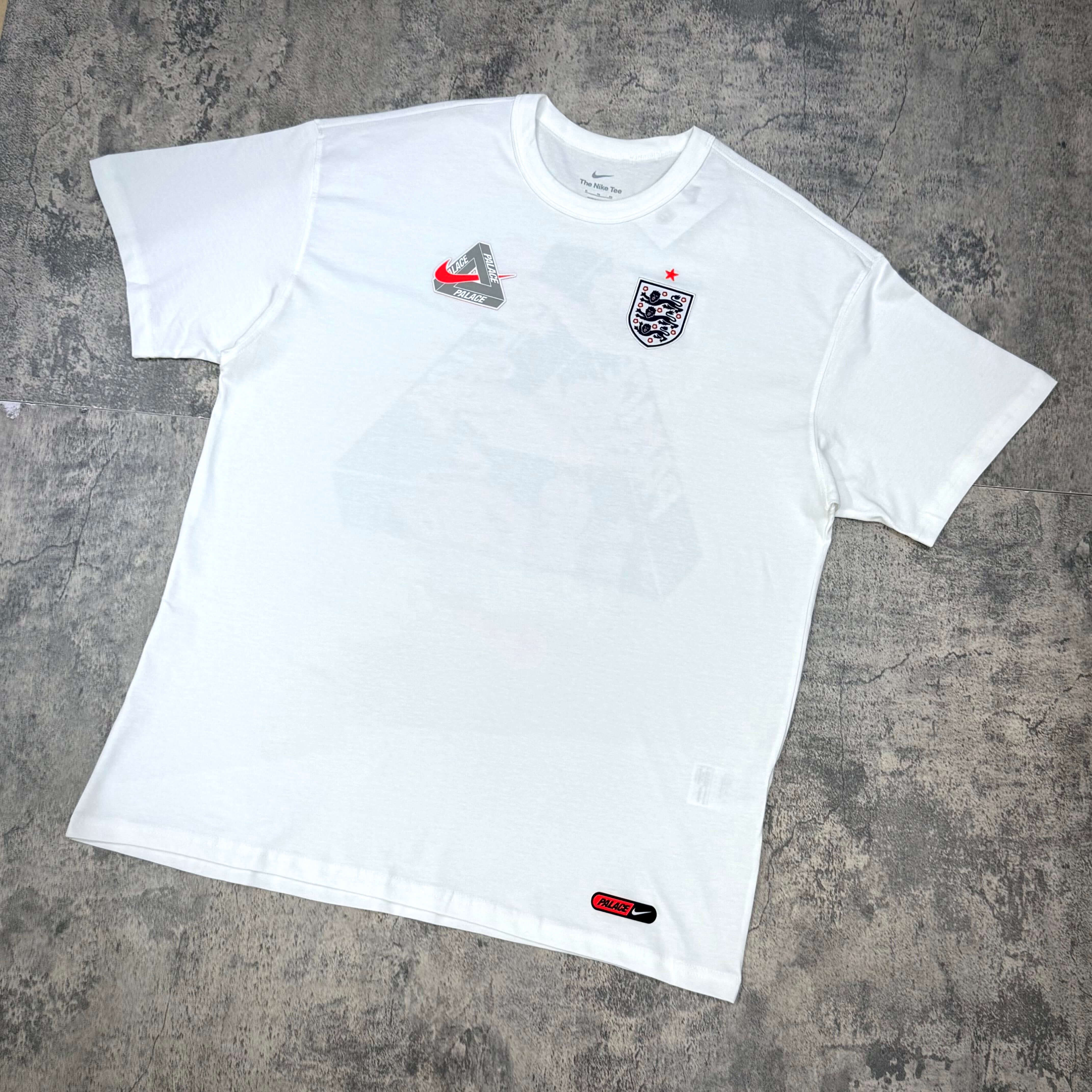 Palace x Nike England Tee featuring a white design and England crest, highlighting collaboration branding with Nike.