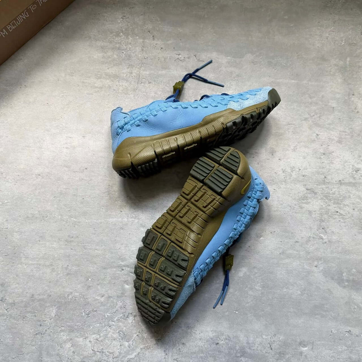 SOULGOODS x Nike Homescape Woven Blue Beyond HM6961-400 shoes from top view showcasing blue and green design.