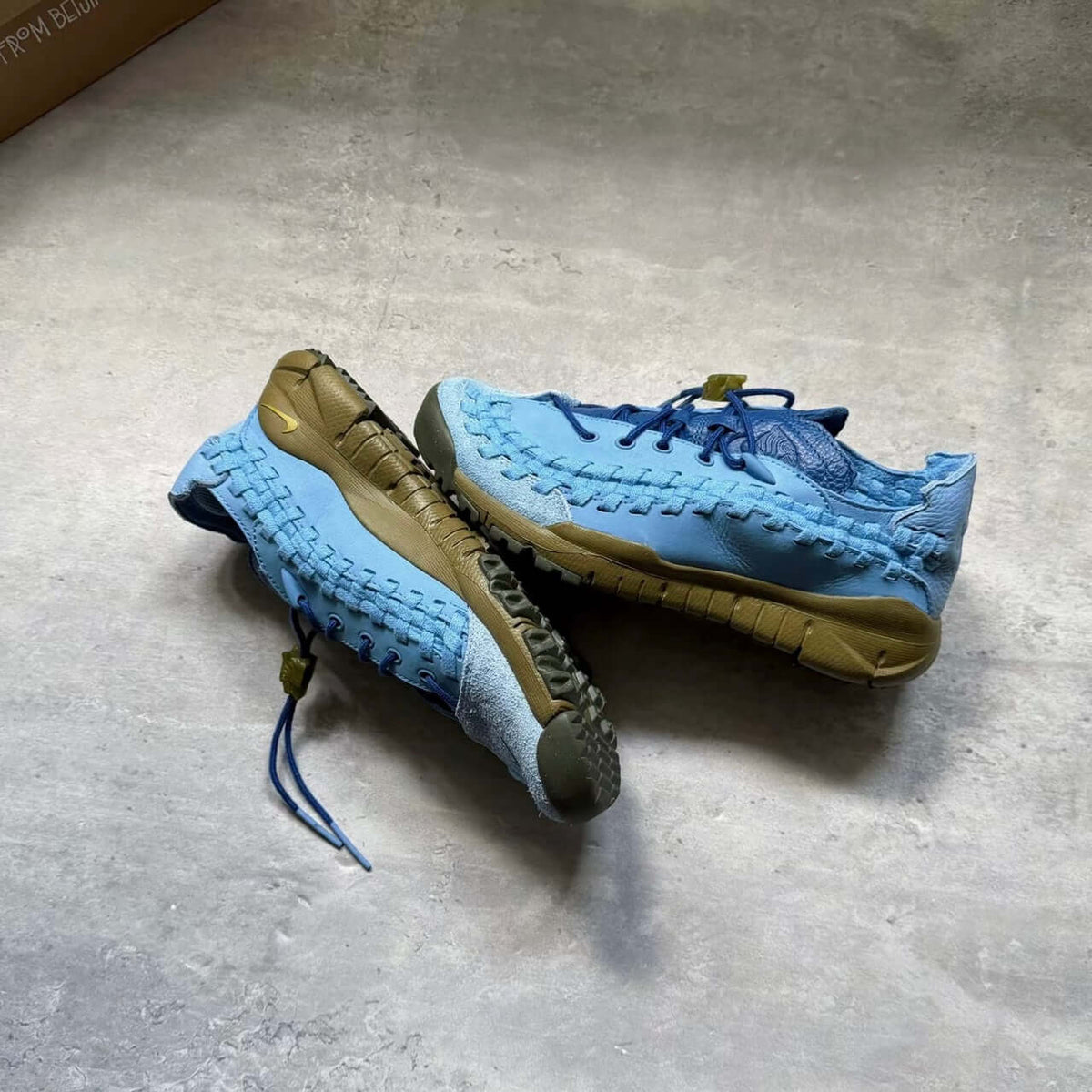 SOULGOODS x Nike Homescape Woven Blue Beyond HM6961-400 shoes on a textured surface.