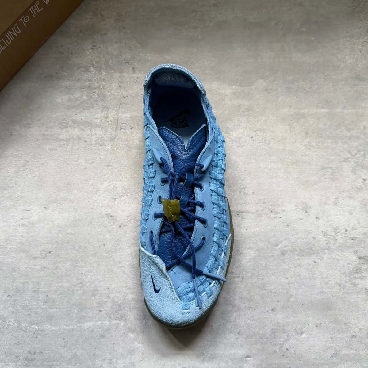 SOULGOODS x Nike Homescape Woven Blue Beyond HM6961-400 sneaker in light blue color with unique woven design.