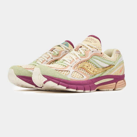 Saucony x Stan Birch ProGrid Guide 7 running shoes with pastel colors and unique design.