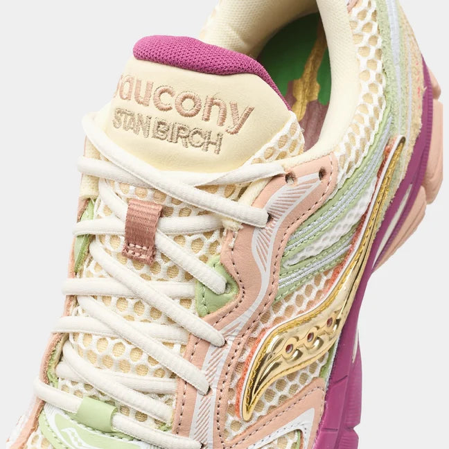 Saucony x Stan Birch ProGrid Guide 7 close-up showcasing colorful design and mesh details.