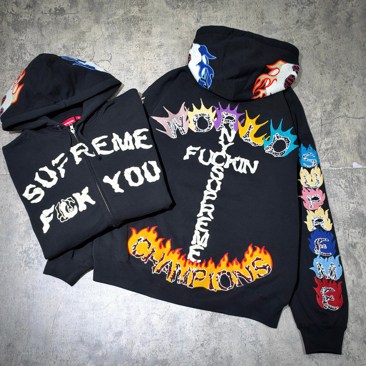 Supreme Fuck You Zip Up Hooded Sweatshirt in black, featuring bold graphics and vibrant colors, showcasing unique design elements.