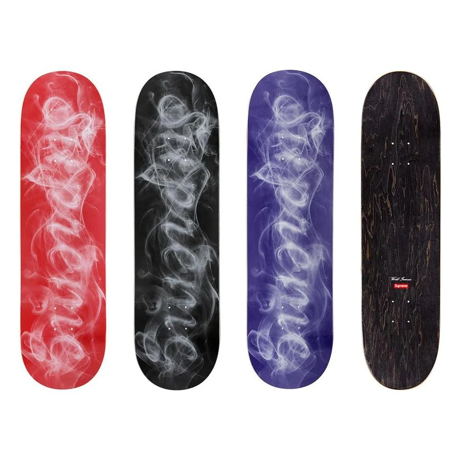 Supreme Smoke Skateboard Deck in red, black, purple, and wood finishes showcasing smoke patterns