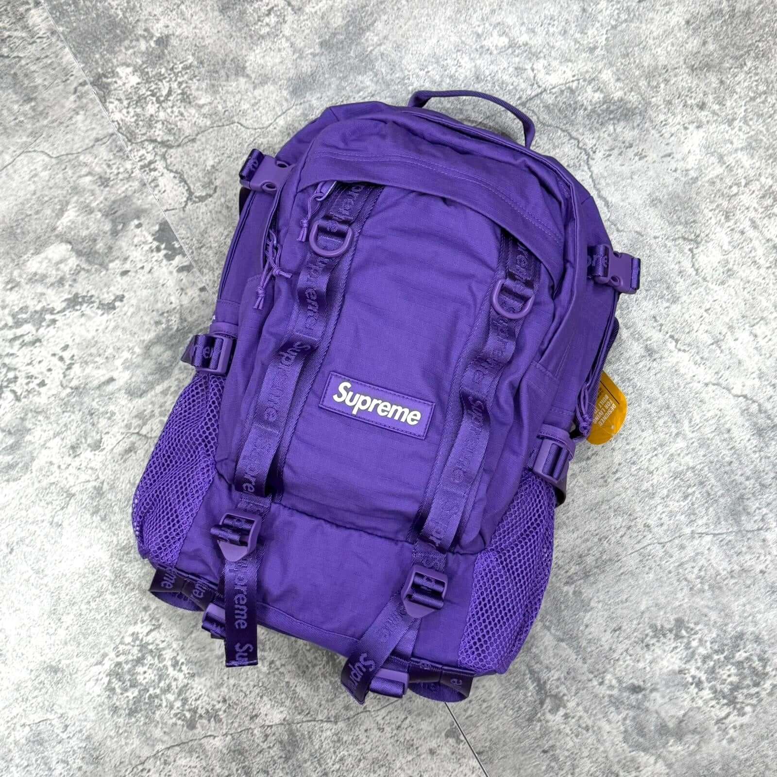 Supreme Backpack SS26 in purple color, featuring adjustable straps and water-resistant Cordura® material.