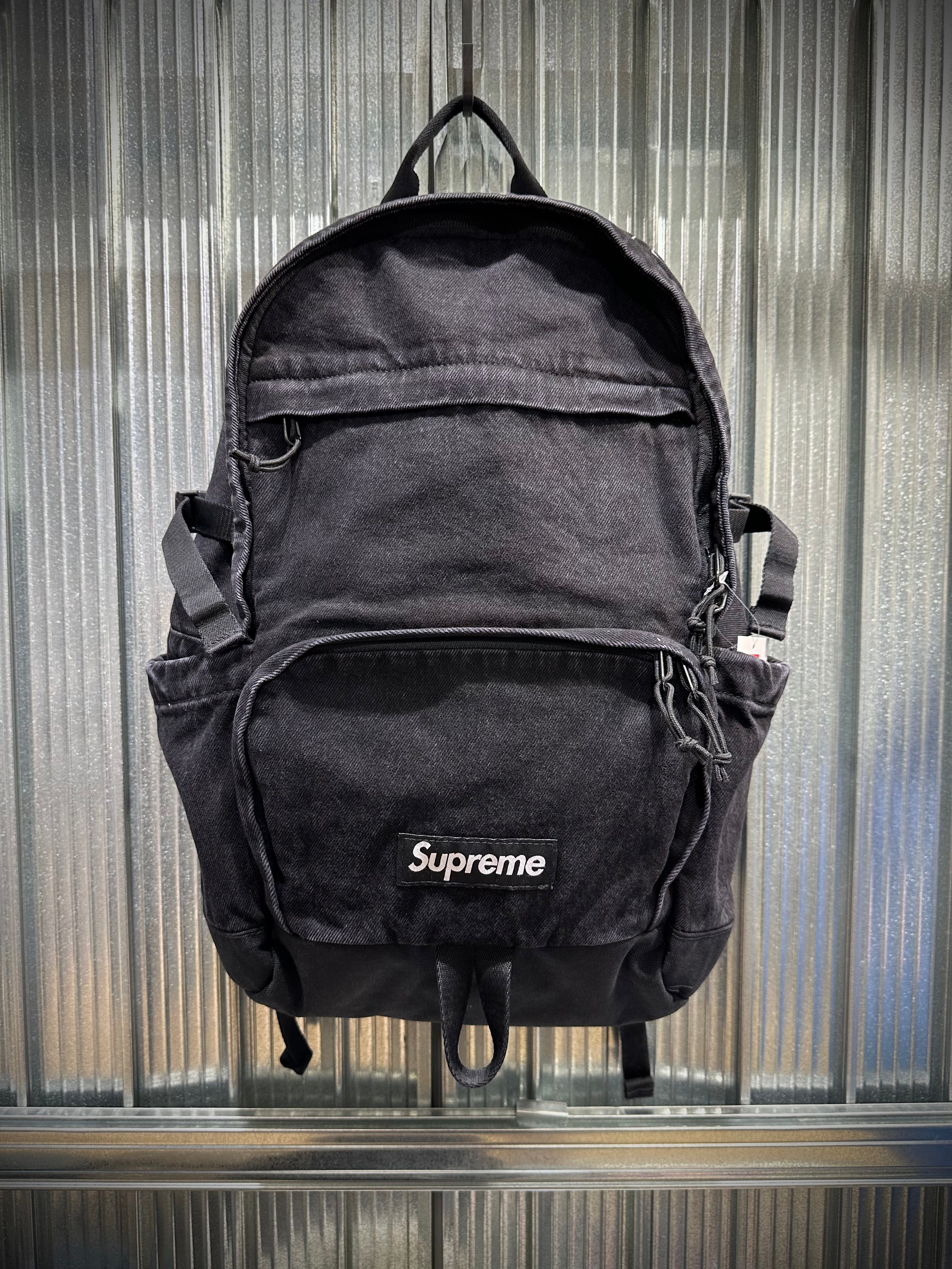 Supreme Denim Backpack FW25 washed indigo black realtree camo white