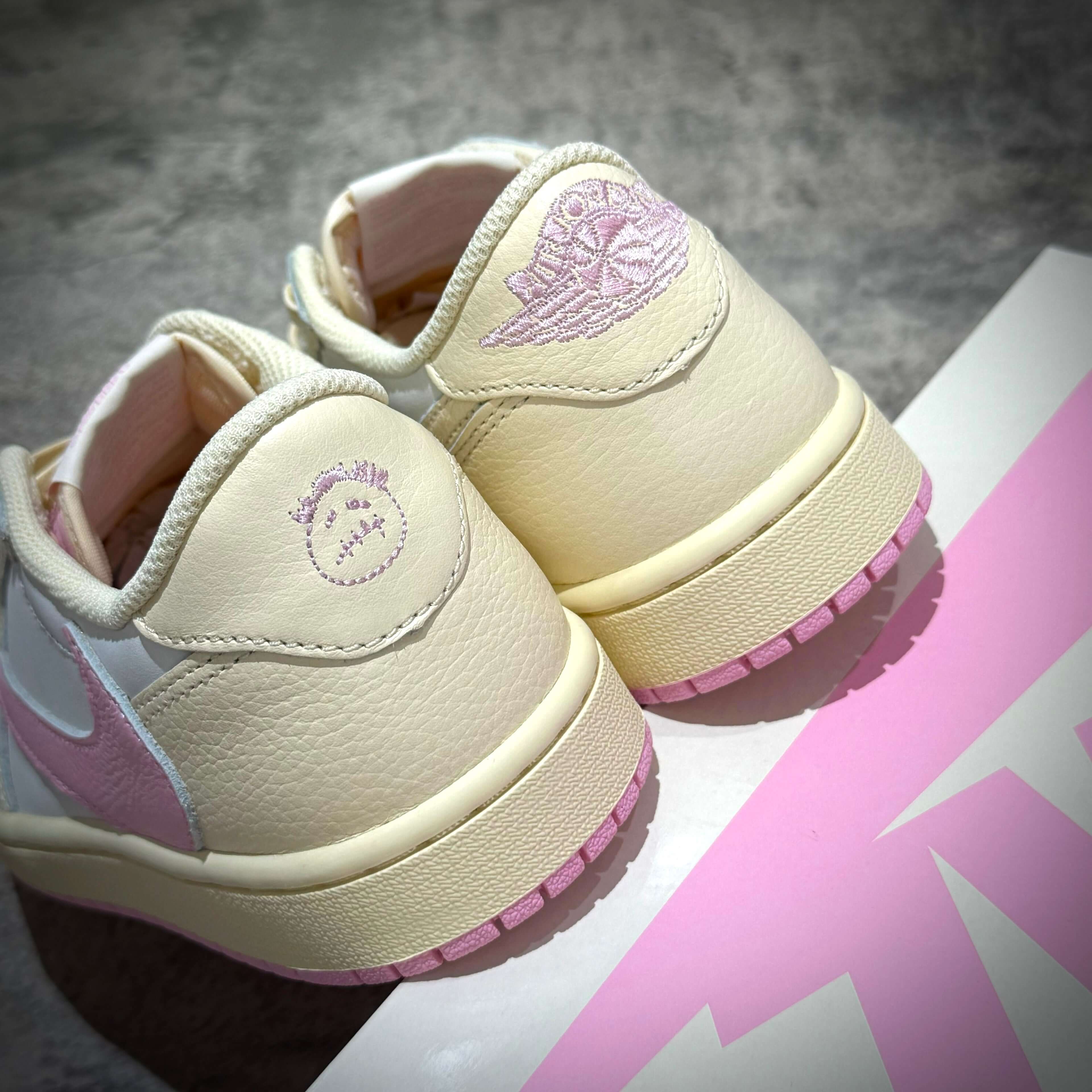 Travis Scott × Nike Air Jordan 1 Retro Low SP - Shy Pink back view showcasing the pink accents and design details.