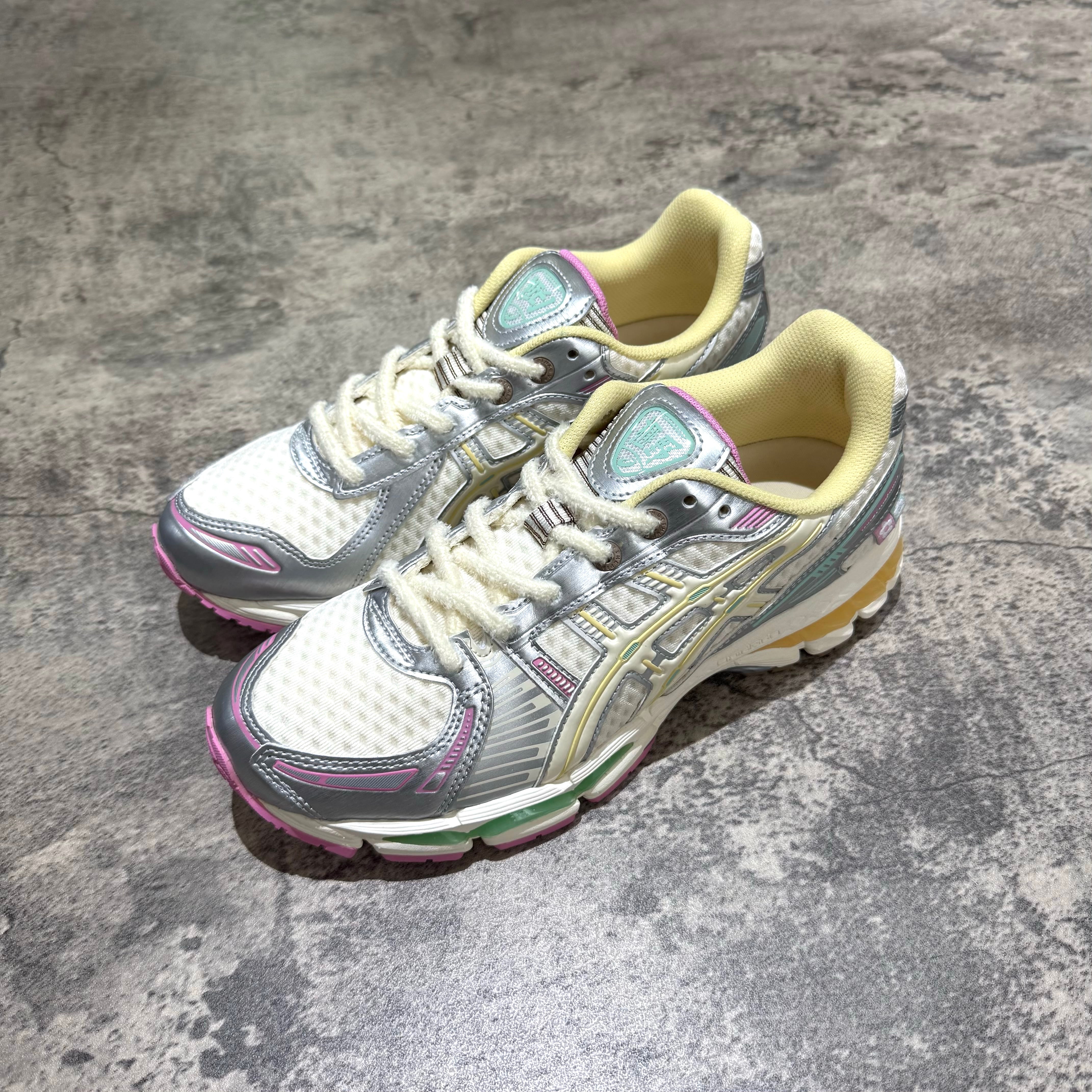 Vandy The Pink x Asics Gel-Kayano 12.1 sneakers in Antique White and Desert Palm colorway, stylish and comfortable.
