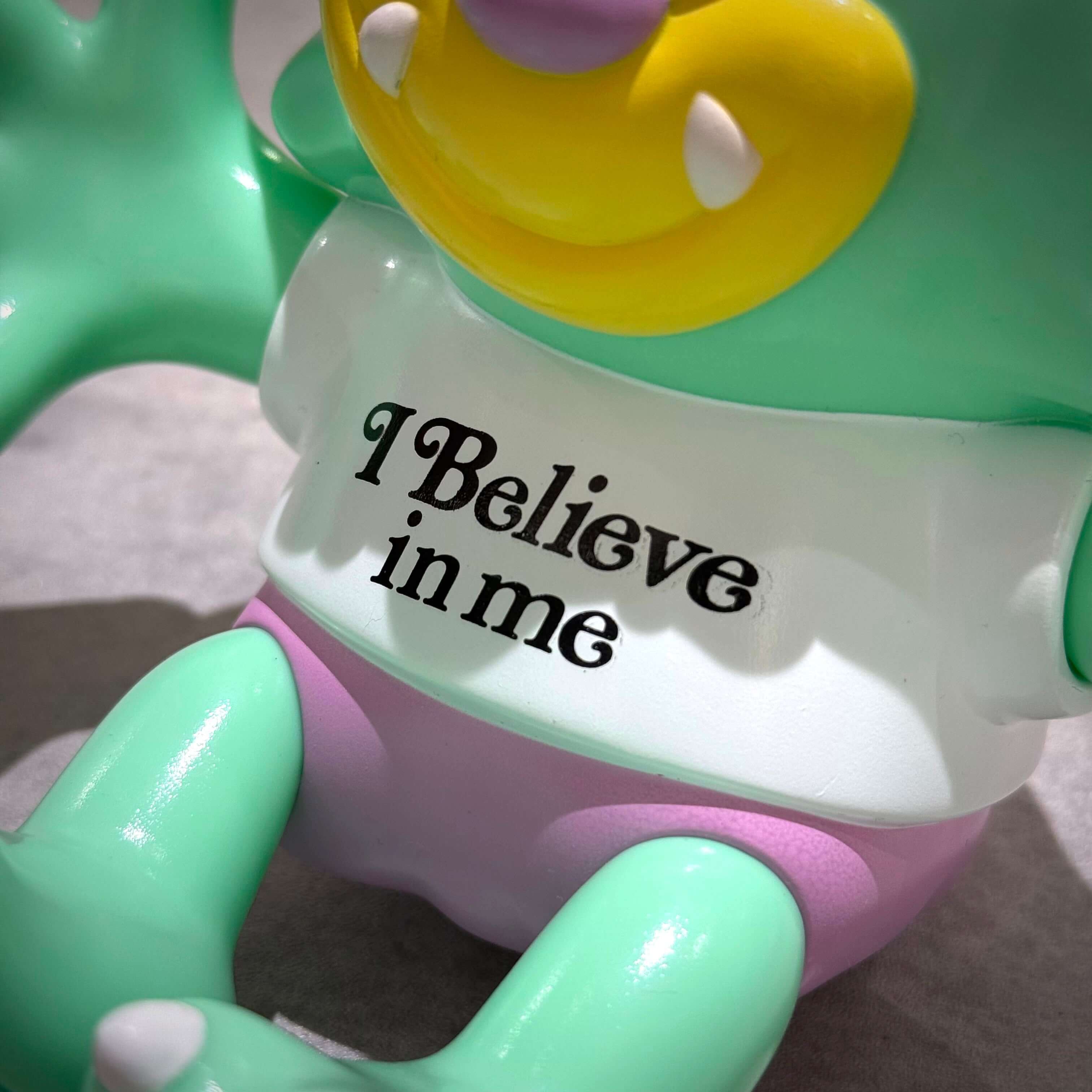 Verdy x Lotte Museum Visty Figure with 'I Believe in me' text on shirt, designed for collectors and fans.