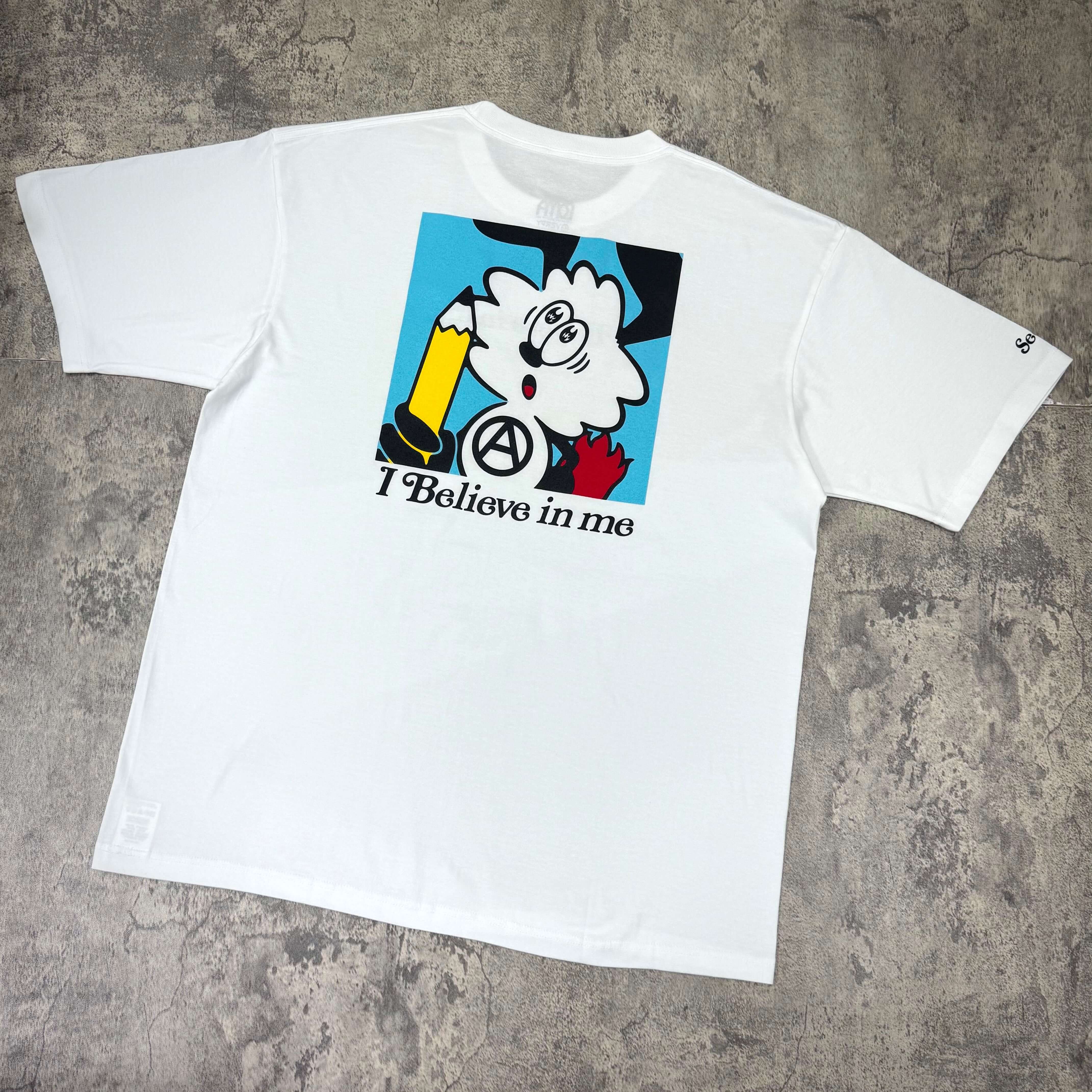 Verdy x Lottemuseum Tee #4 featuring a colorful graphic design and the text 'I Believe in me' on a white background.