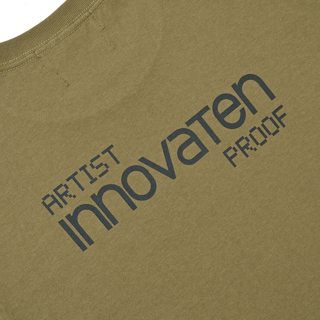 Artist Proof x Fragment x nonnative Innovaten Tee graphic design on an olive green shirt.