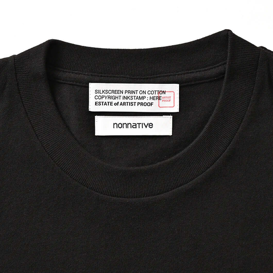 Close-up of the collar and tags on the Artist Proof x Fragment x nonnative Innovaten Tee, showcasing brand labels.
