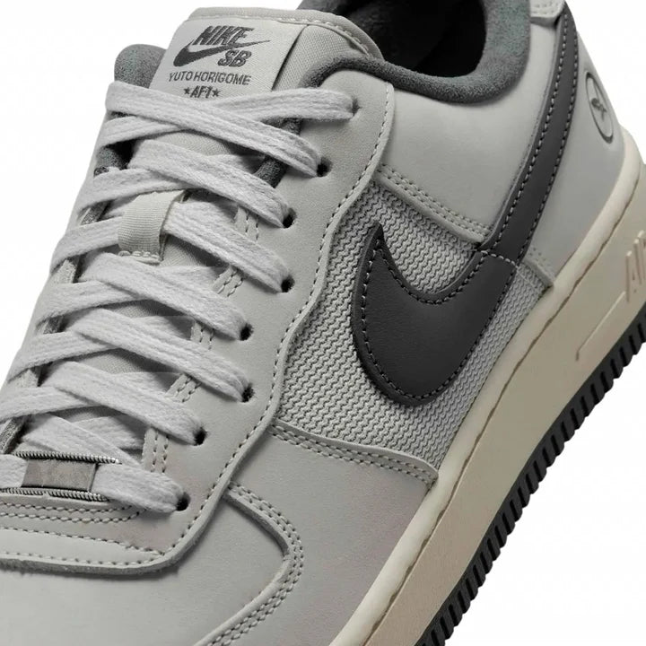 Yuto Horigome x Nike SB Air Force 1 Low IO8439-100 Pre-order close-up view of the sneaker's upper and detailing.