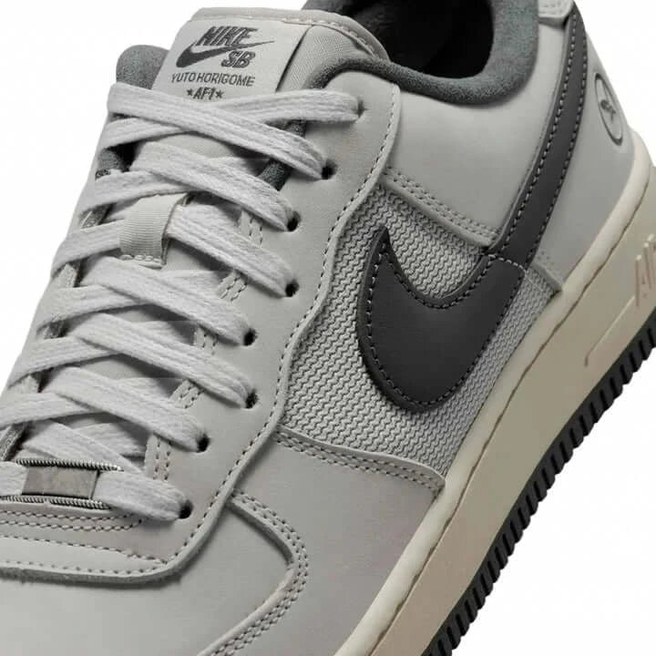 Yuto Horigome x Nike SB Air Force 1 Low IO8439-100 Pre-order close-up view of the sneaker's upper and detailing.