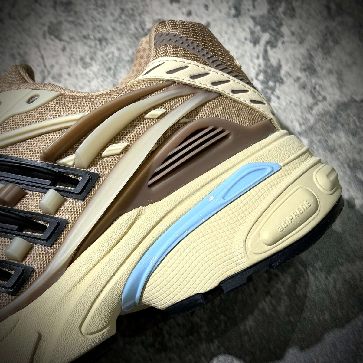 Close-up shot of adidas Adistar Jellyfish by Pharrell Williams Crystal Sand KH6729 sneaker showing details and textures.