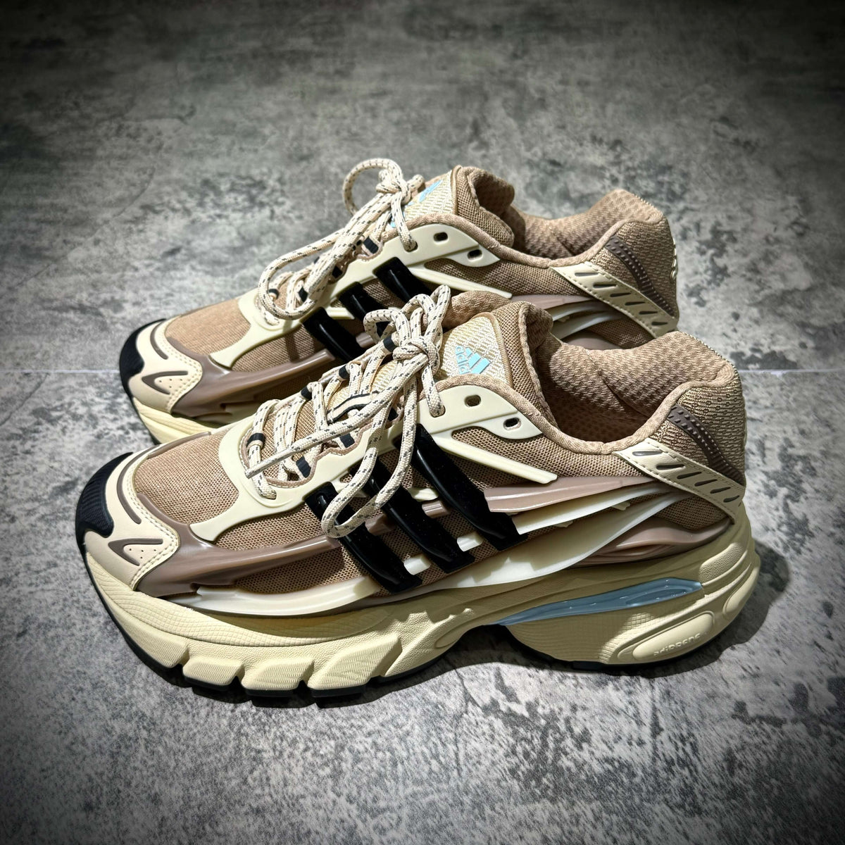 adidas Adistar Jellyfish by Pharrell Williams Crystal Sand KH6729 sneakers in sandy beige and black colorway.