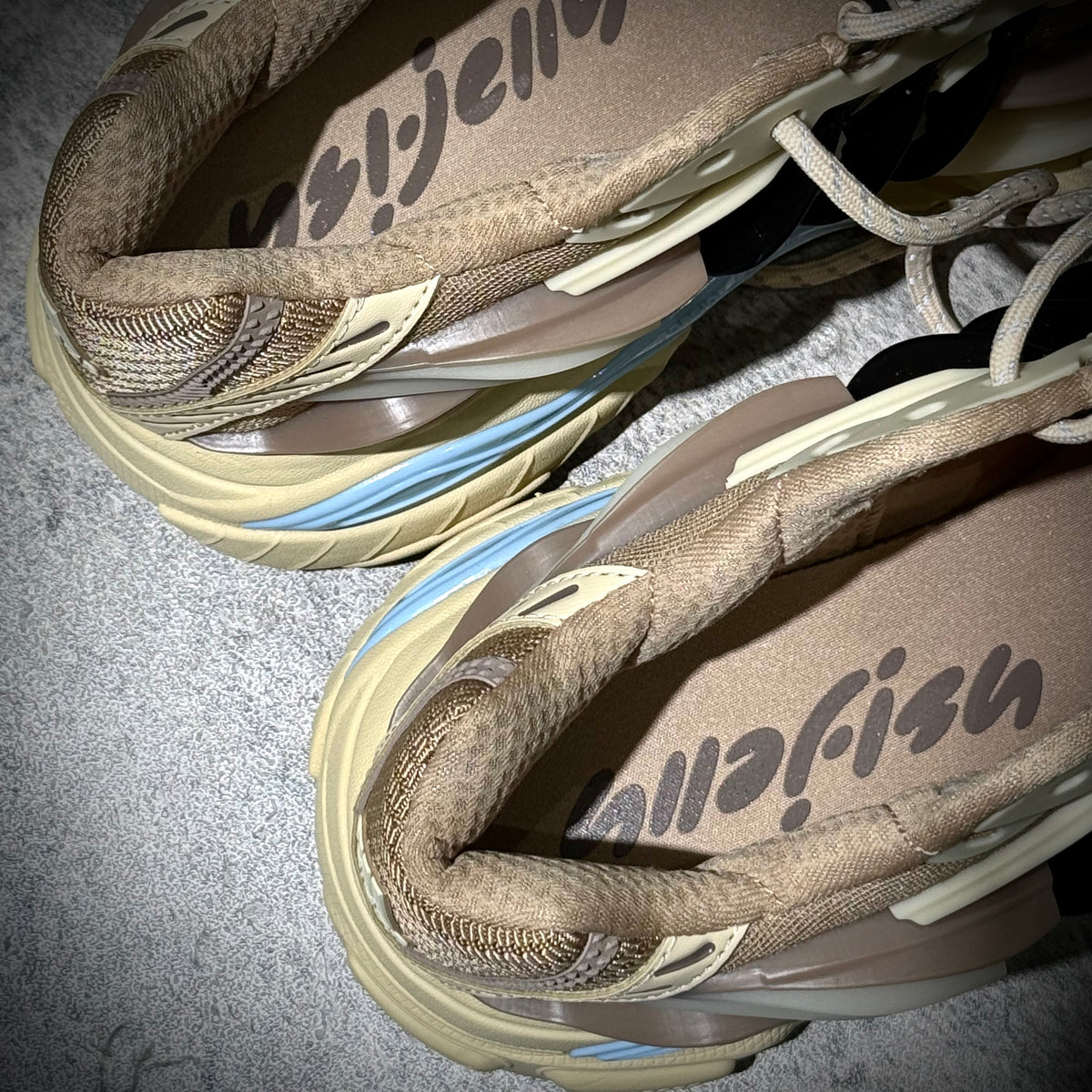 Close-up view of the adidas Adistar Jellyfish by Pharrell Williams Crystal Sand KH6729 shoes, showcasing the intricate design.