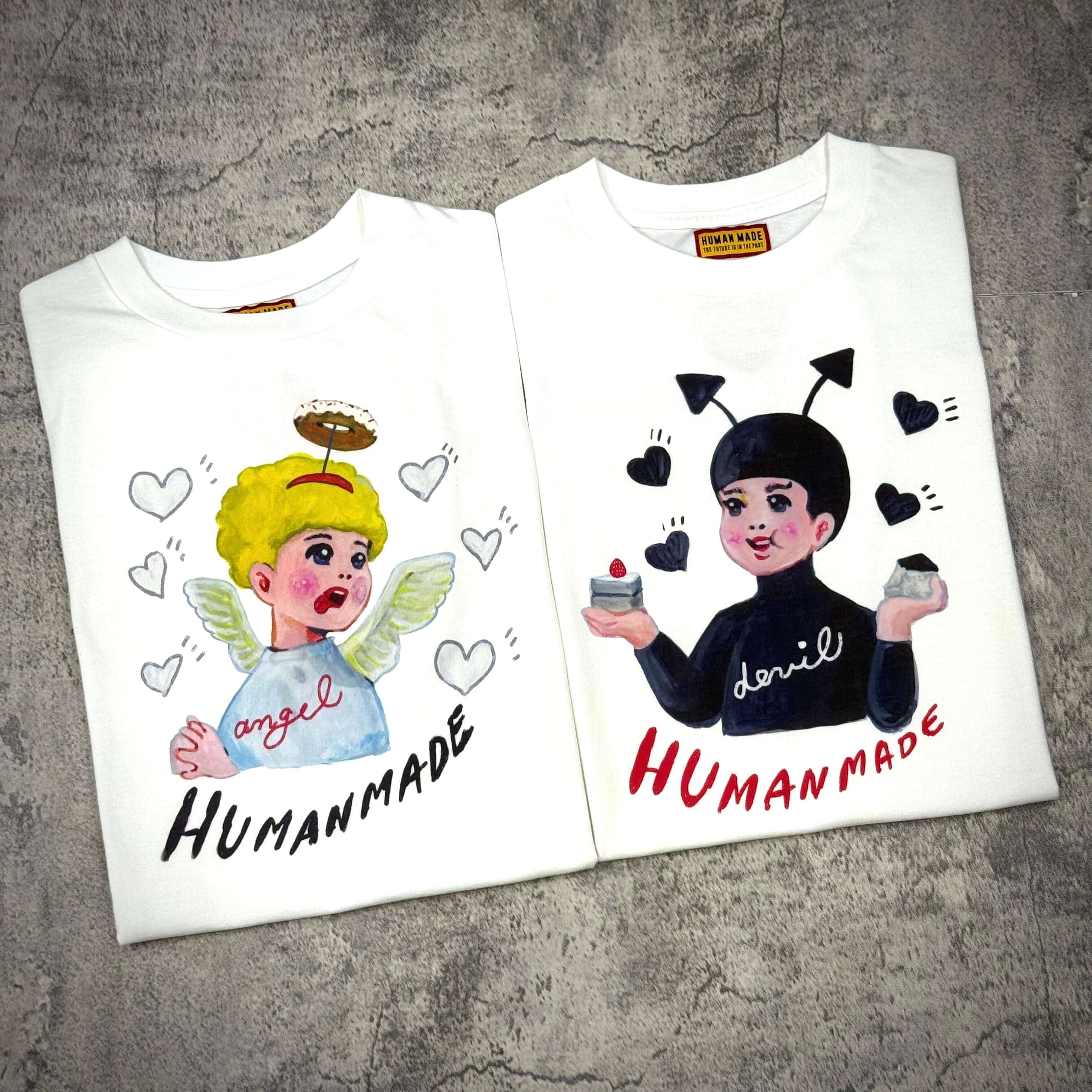 Human Made Keiko Sootome "Angel vs Demon" Tee design featuring angel and devil characters.