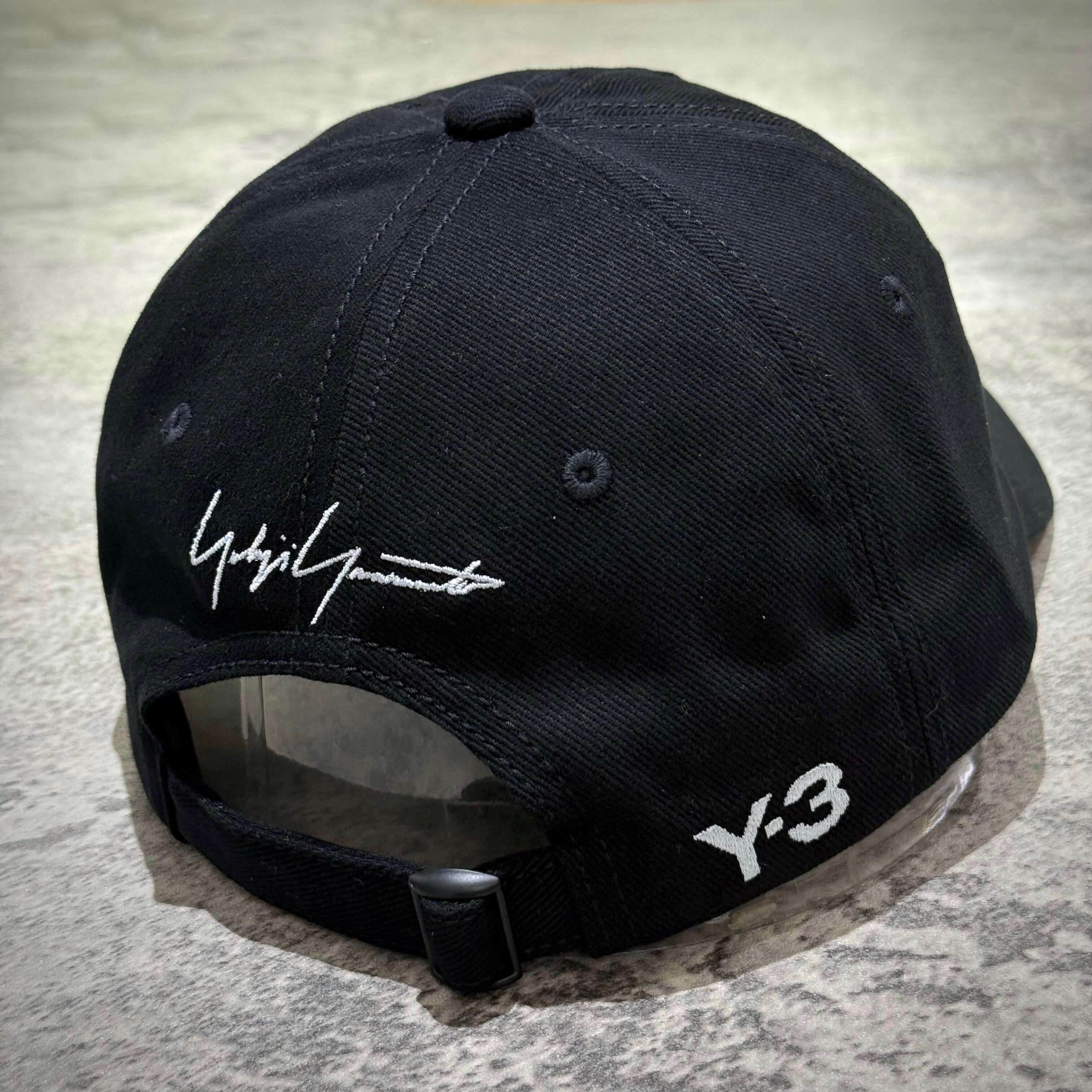 Back view of the Y-3 x Mercedes AMG Petronas F1 Dad Cap showcasing signature design and branding.
