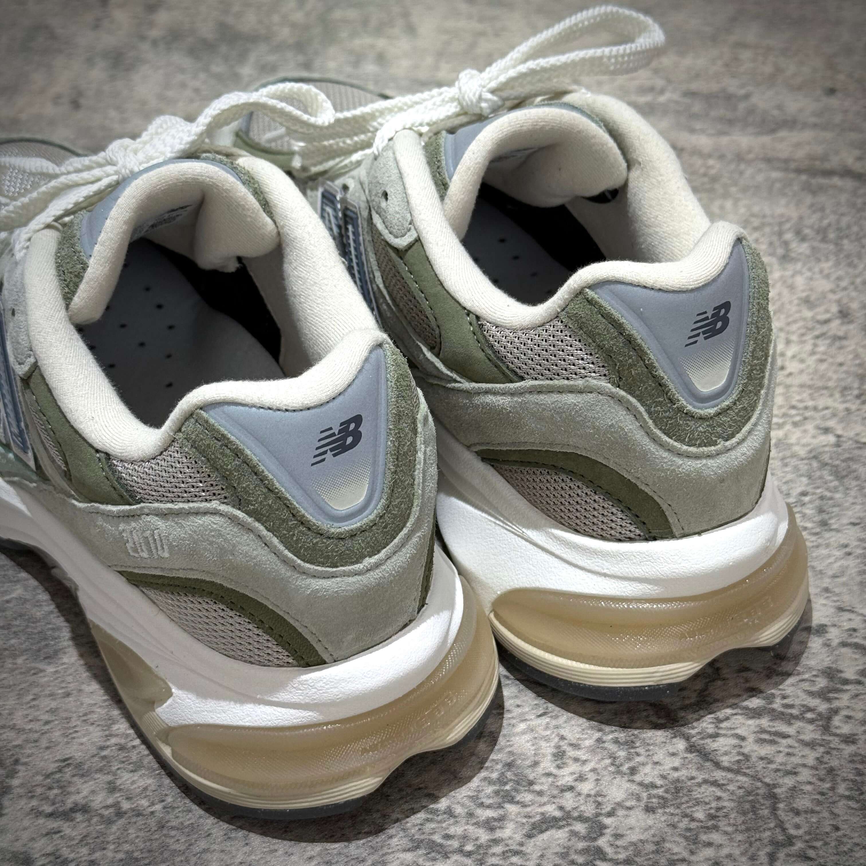 Close-up of the back view of New Balance U20105K7 Wasabi Green sneakers, showcasing the design and color details.