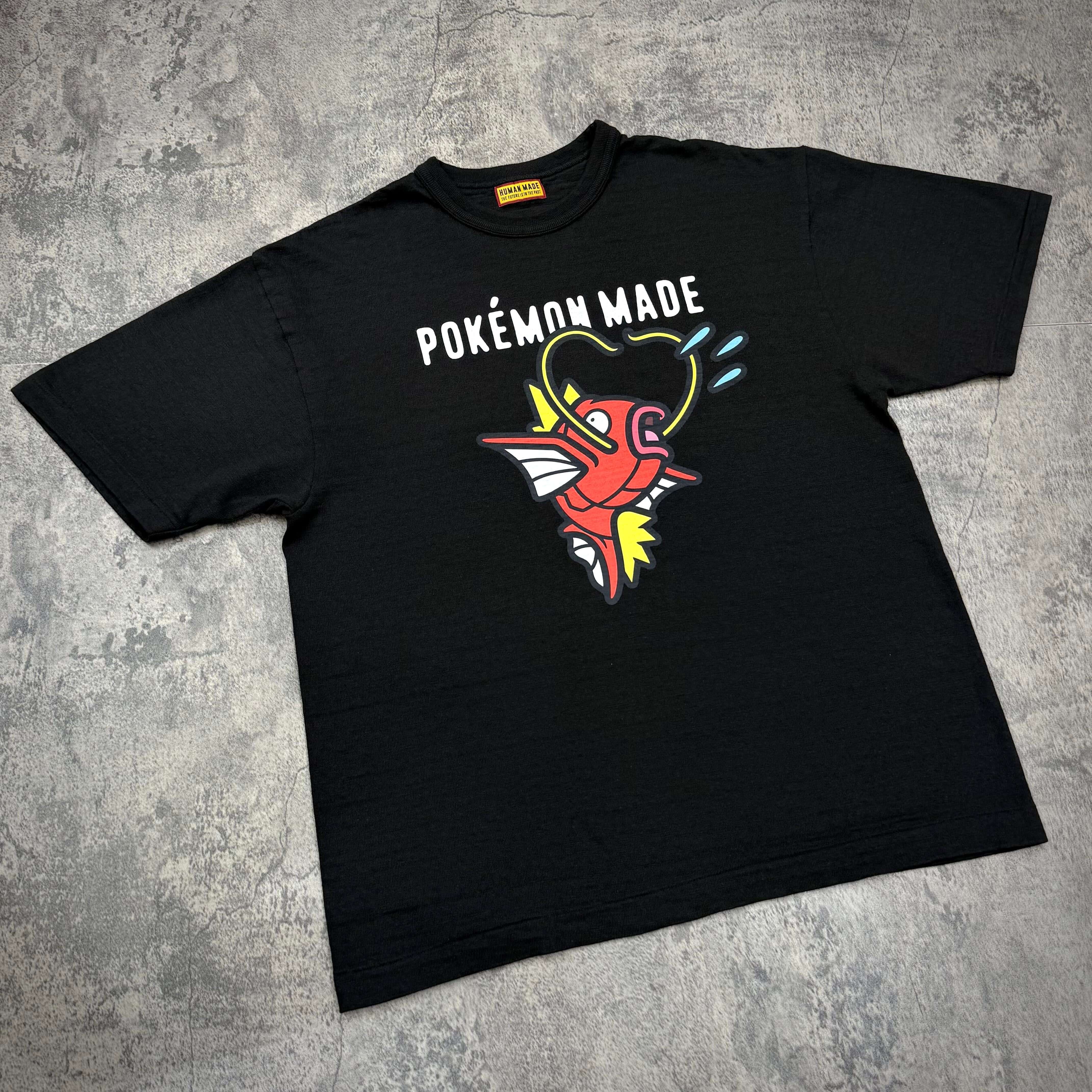 Human Made x Pokemon Graphic Tee with Magikarp design on black fabric, perfect for fans and collectors.