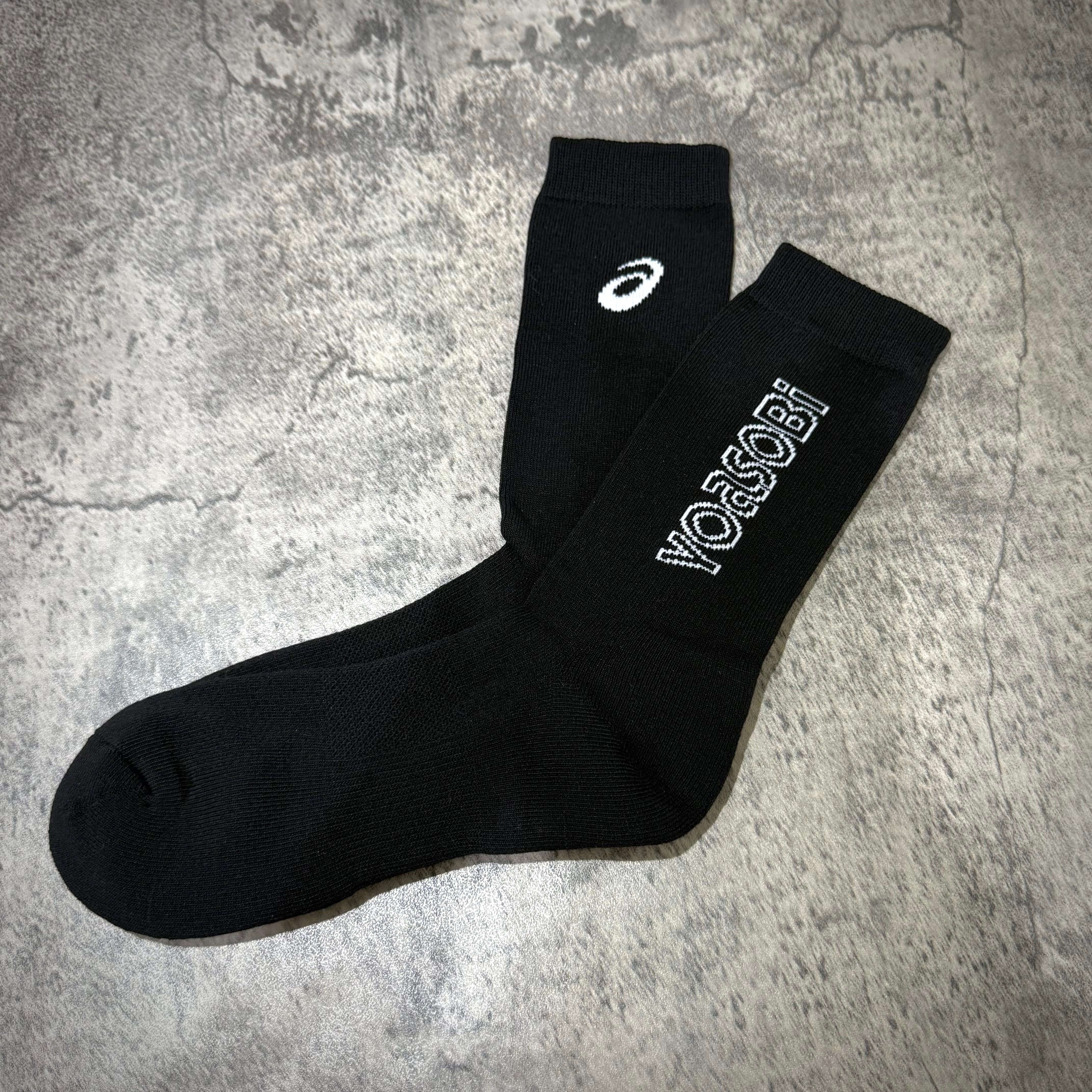 Yoasobi x Asics Logo Socks in black featuring the Yoasobi logo, stylish and comfortable, perfect for any casual outfit.