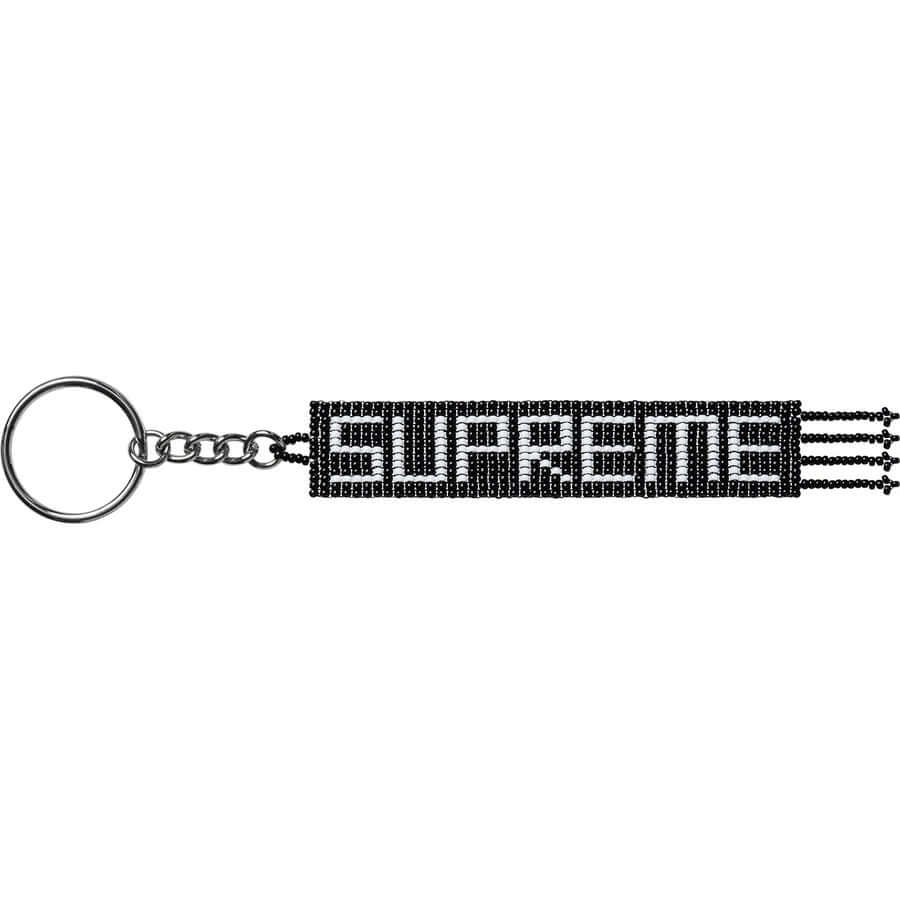 Supreme Beaded Keychain featuring a unique design with a stylish key ring attachment.
