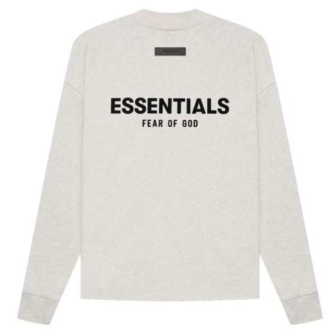 Fear of God Essentials Logo L/S Tee SS22 back view, featuring bold black text on gray fabric.