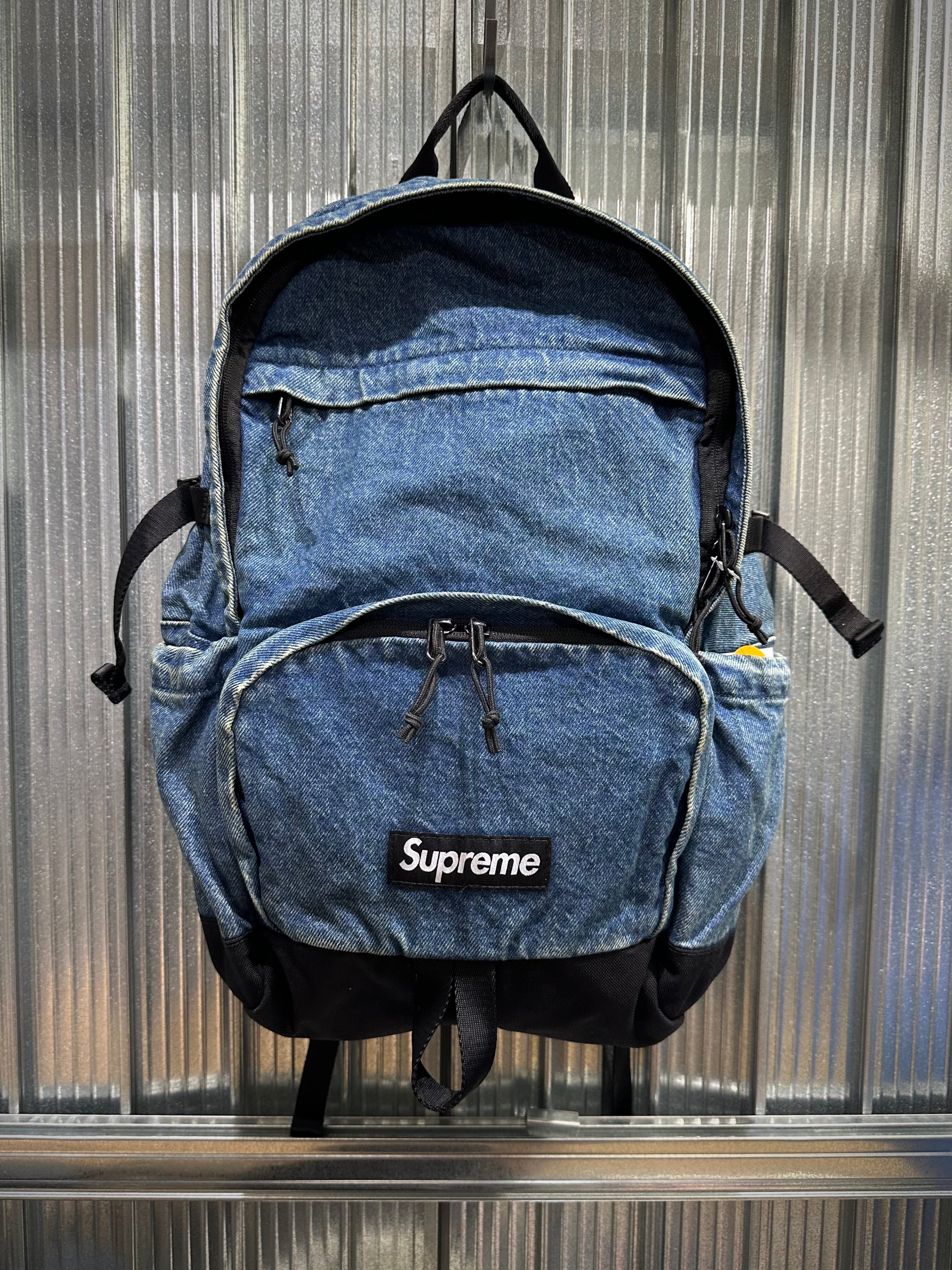 Supreme Denim Backpack FW25 washed indigo black realtree camo white