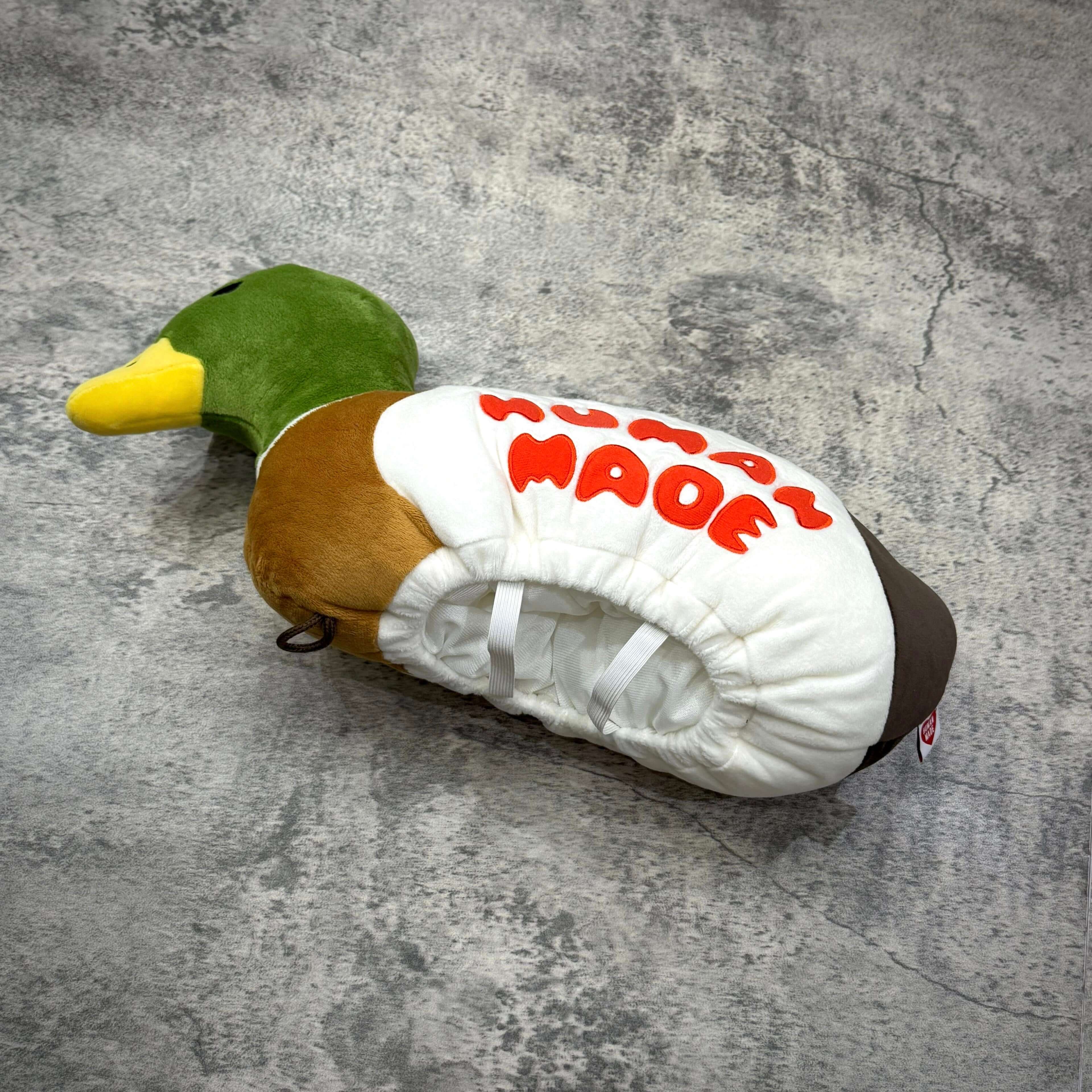 Human Made Duck Plush Doll Tissue Case designed as a cute plush duck with vibrant colors and functional tissue storage.